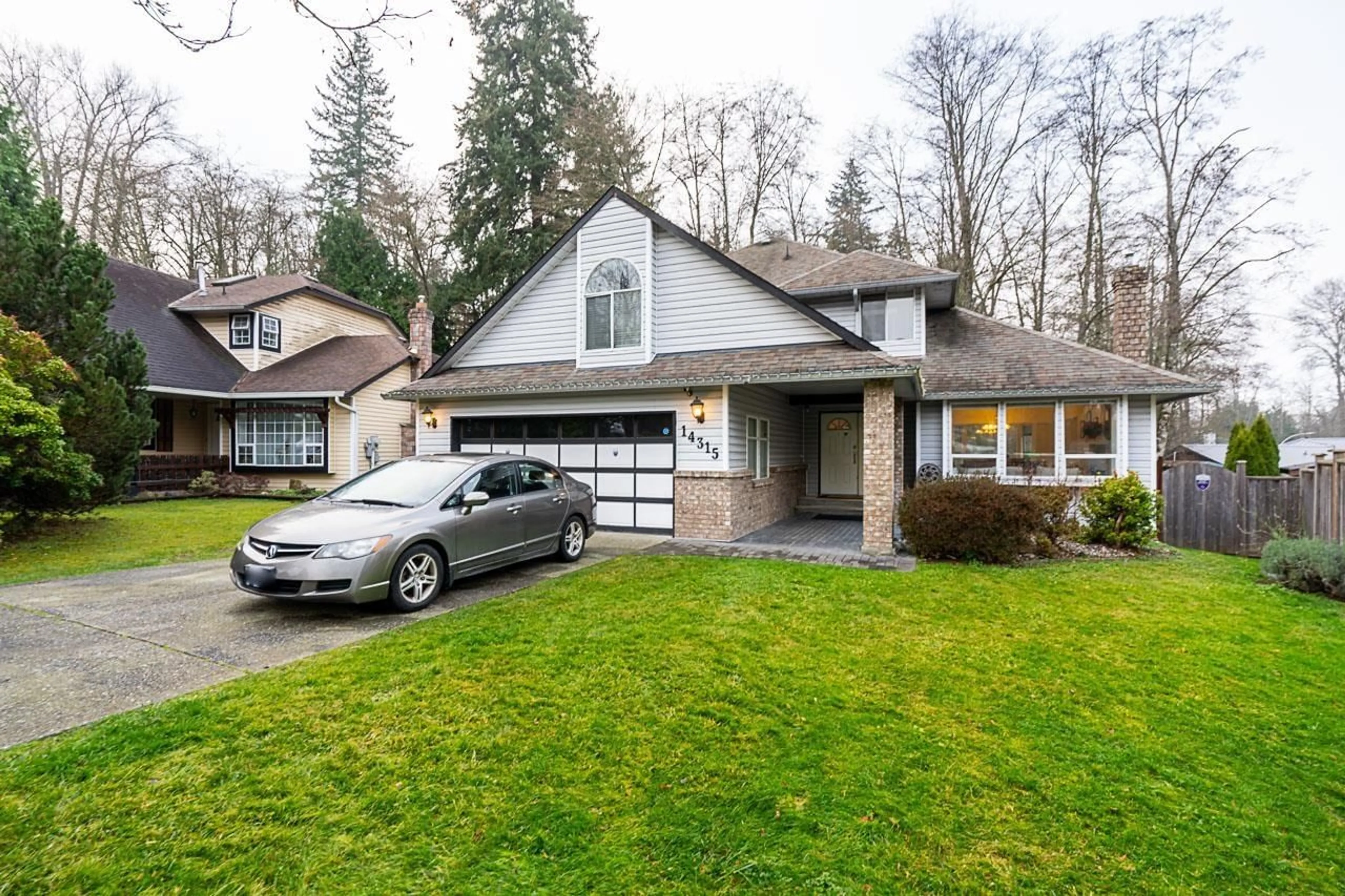 Home with vinyl exterior material, street for 14315 78A AVENUE, Surrey British Columbia V3W9W2