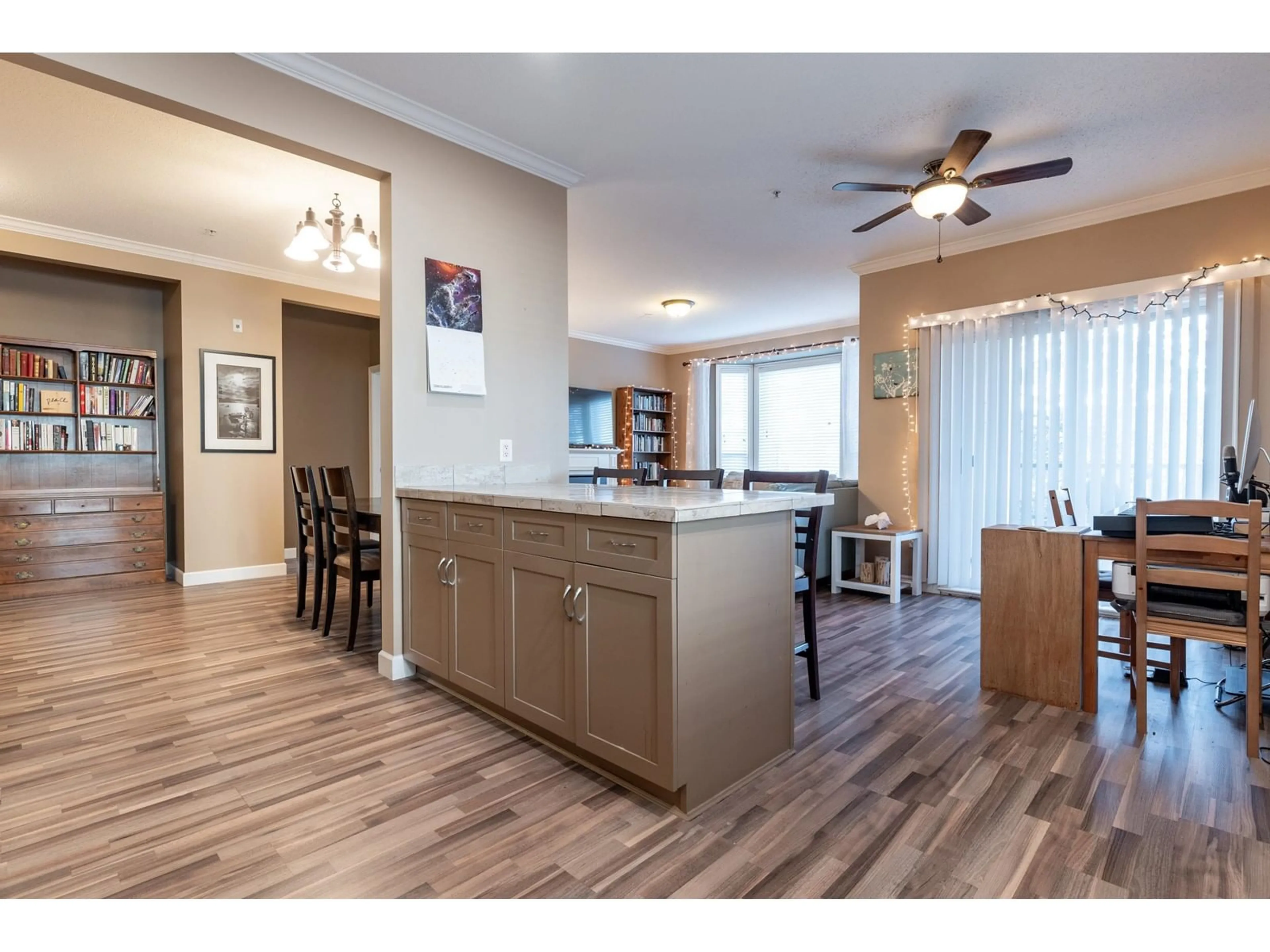 Open concept kitchen, wood/laminate floor for 202 20281 53A AVENUE, Langley British Columbia V3A3V6