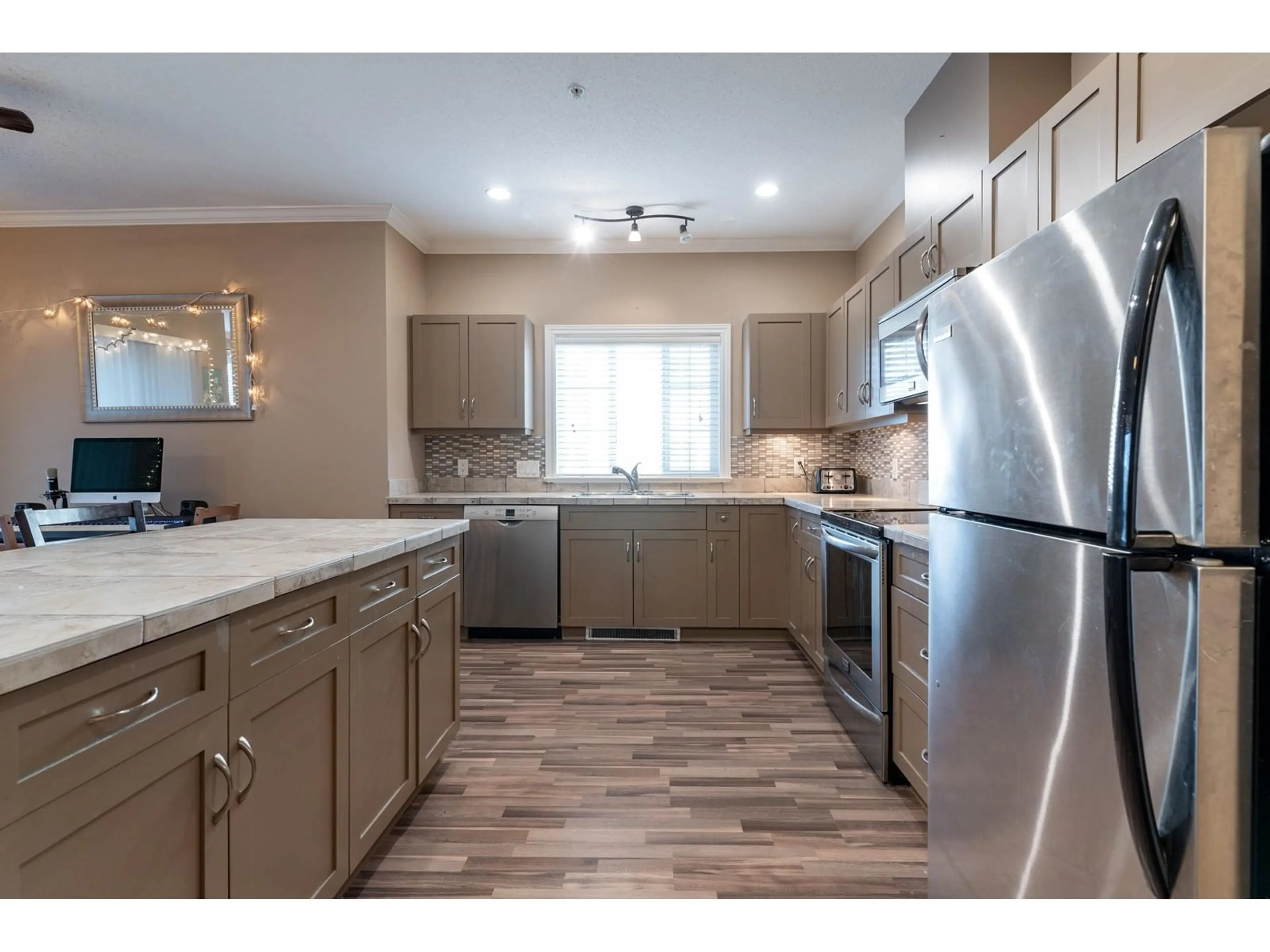 Open concept kitchen, unknown for 202 20281 53A AVENUE, Langley British Columbia V3A3V6