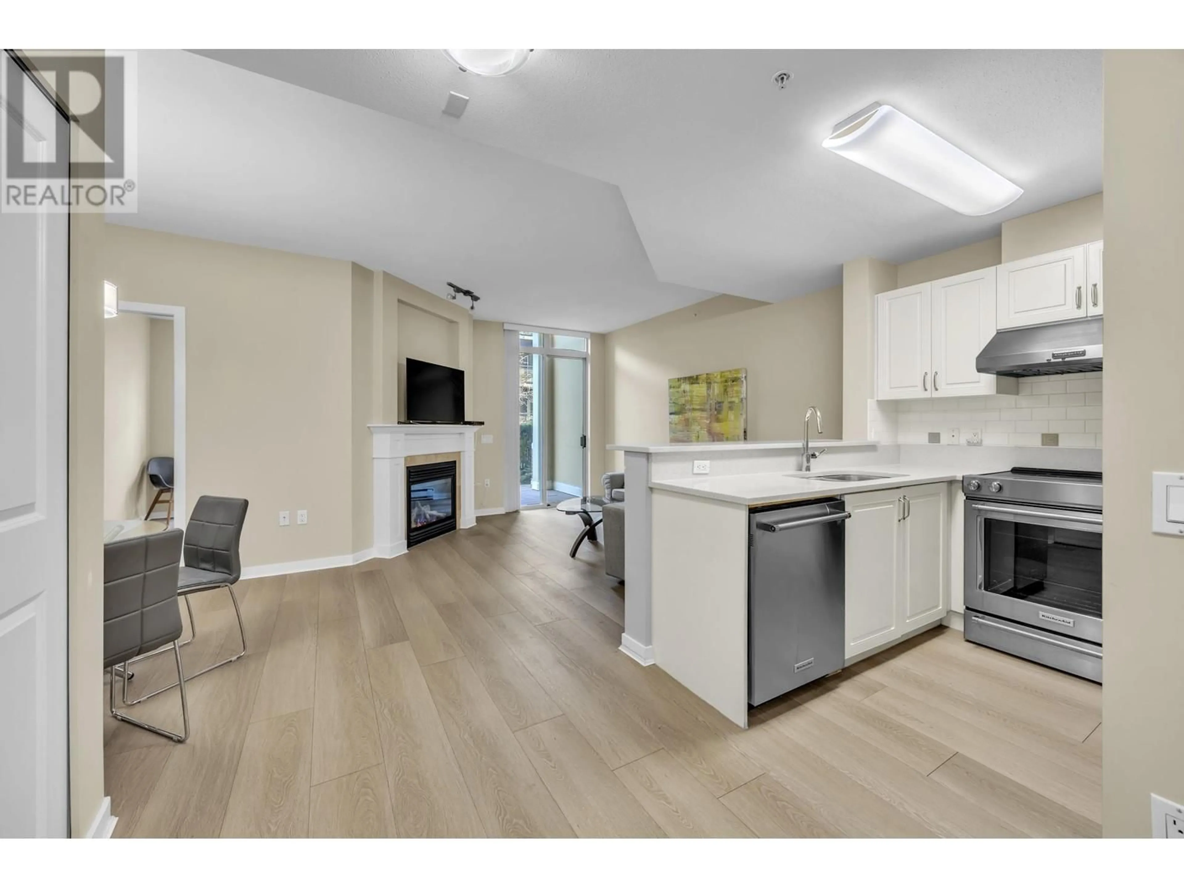 Open concept kitchen, unknown for 107 2799 YEW STREET, Vancouver British Columbia V6K4W2