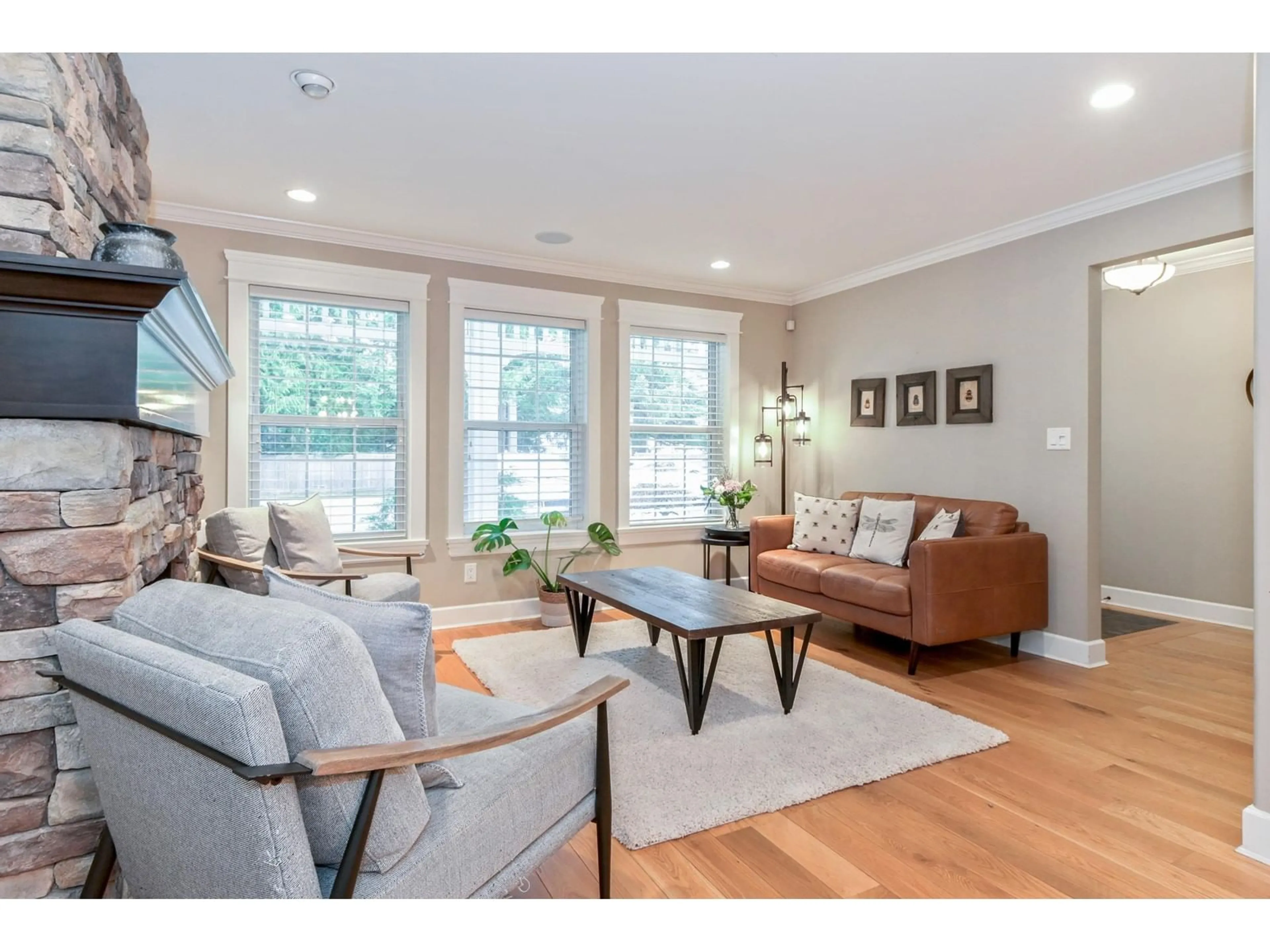 Living room with furniture, wood/laminate floor for 20928 43A AVENUE, Langley British Columbia V3A8S8