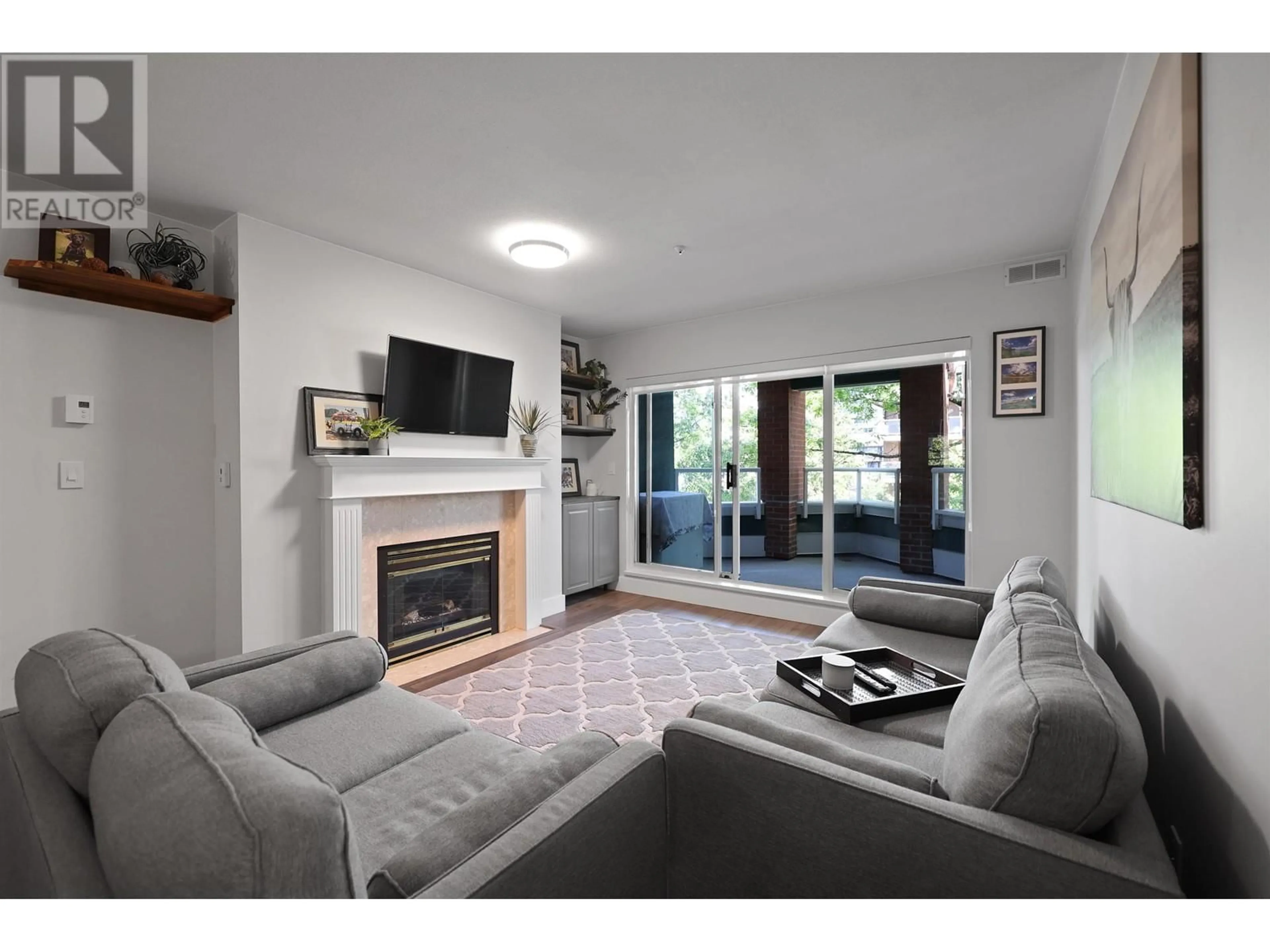 Living room with furniture, unknown for 306 - 128 8TH STREET, North Vancouver British Columbia V7M3M1