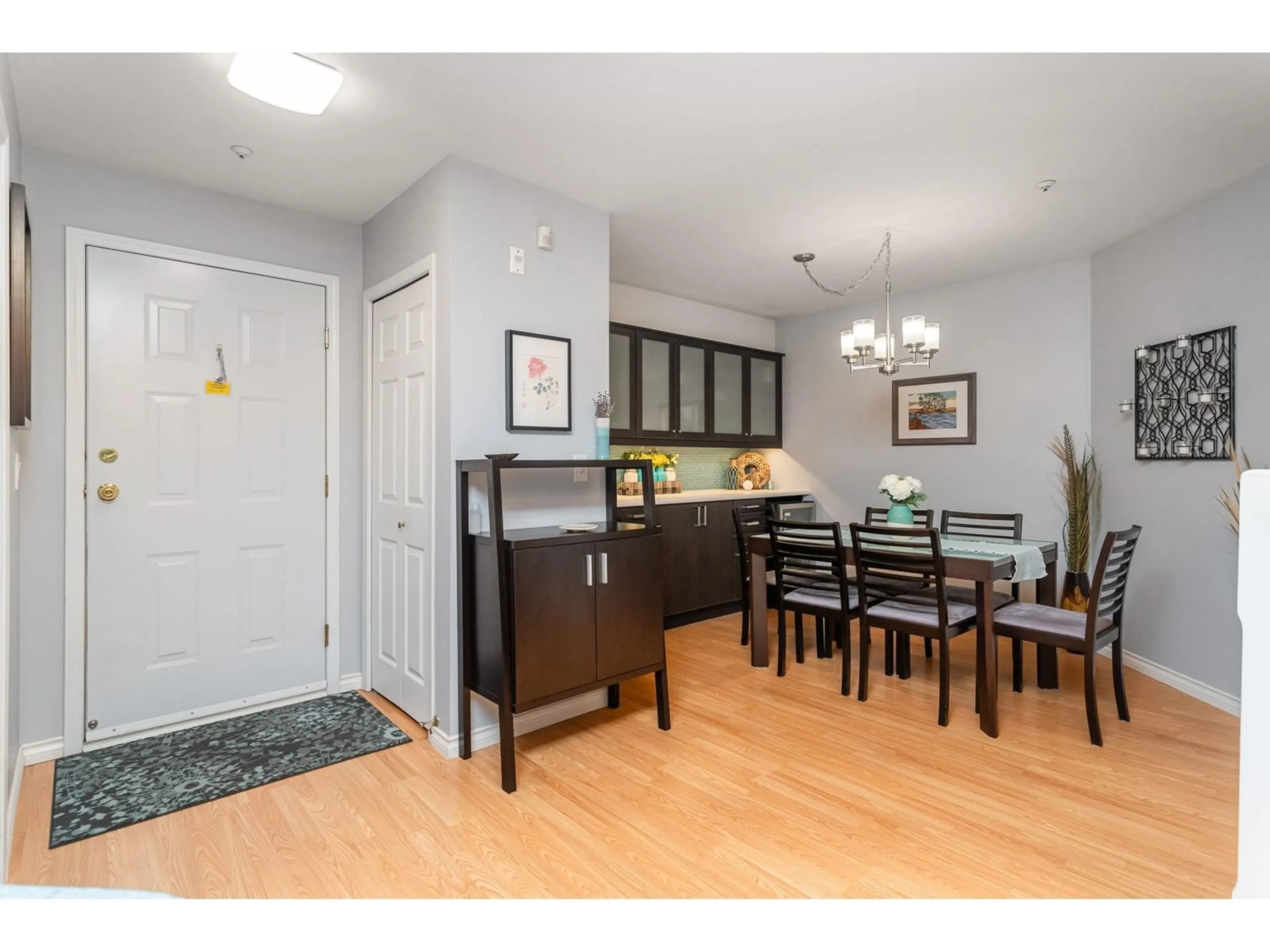 Dining room, wood/laminate floor for 301 12088 66 AVENUE, Surrey British Columbia V3W1Z9