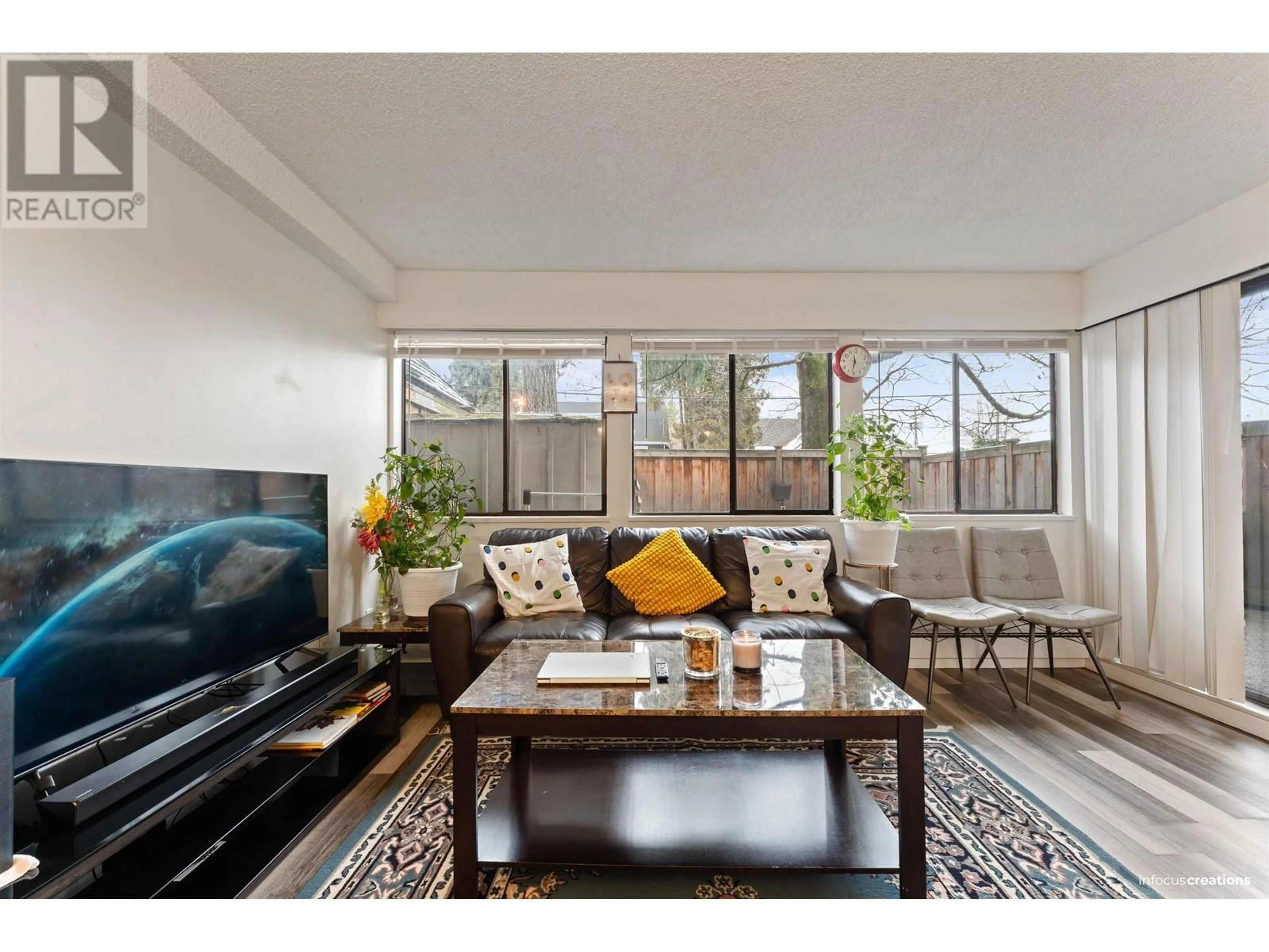 Living room with furniture, wood/laminate floor for 107 - 316 CEDAR STREET, New Westminster British Columbia V3L3P1