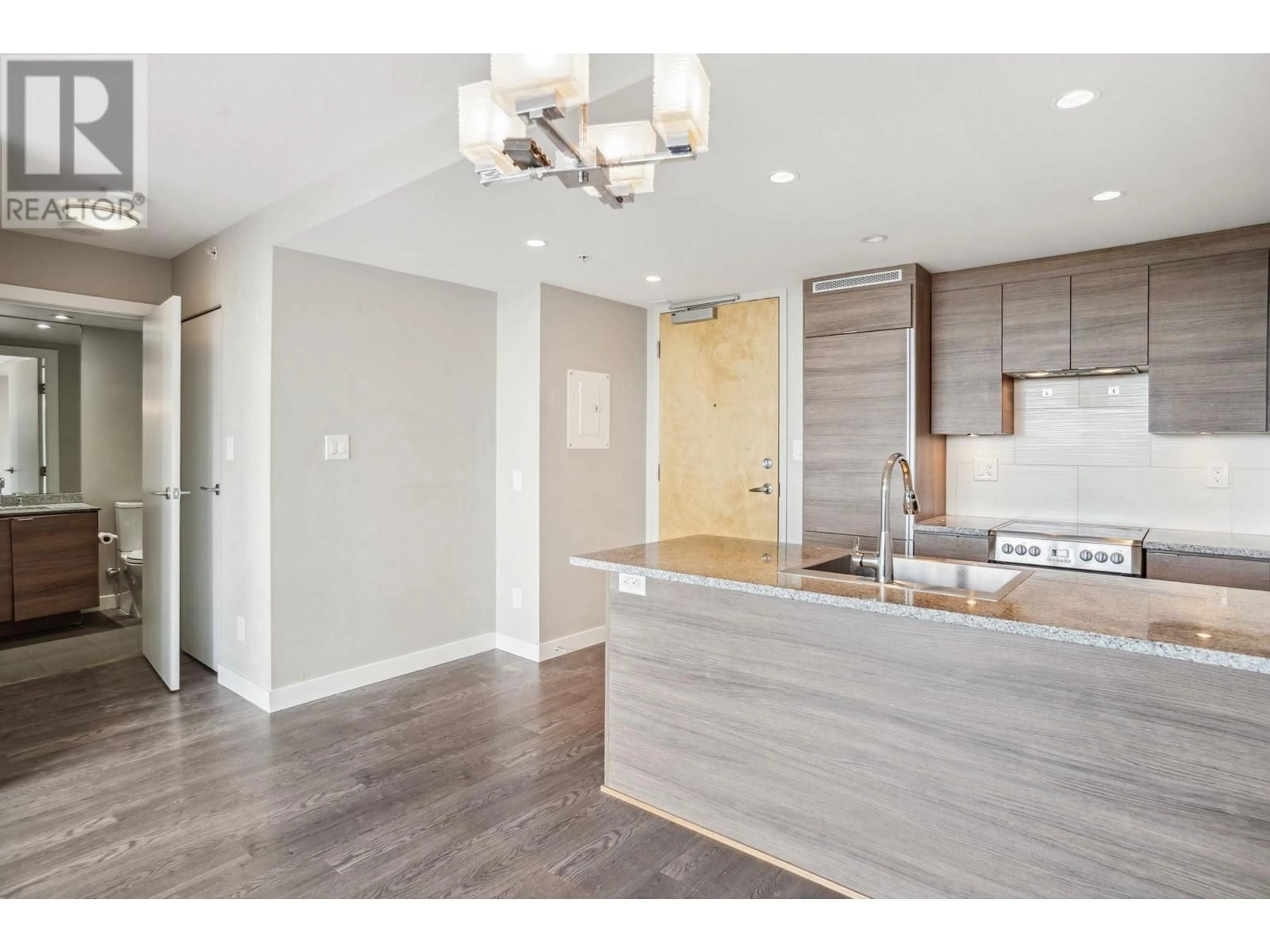 Open concept kitchen, wood/laminate floor for 1104 489 INTERURBAN WAY, Vancouver British Columbia V5X0C7