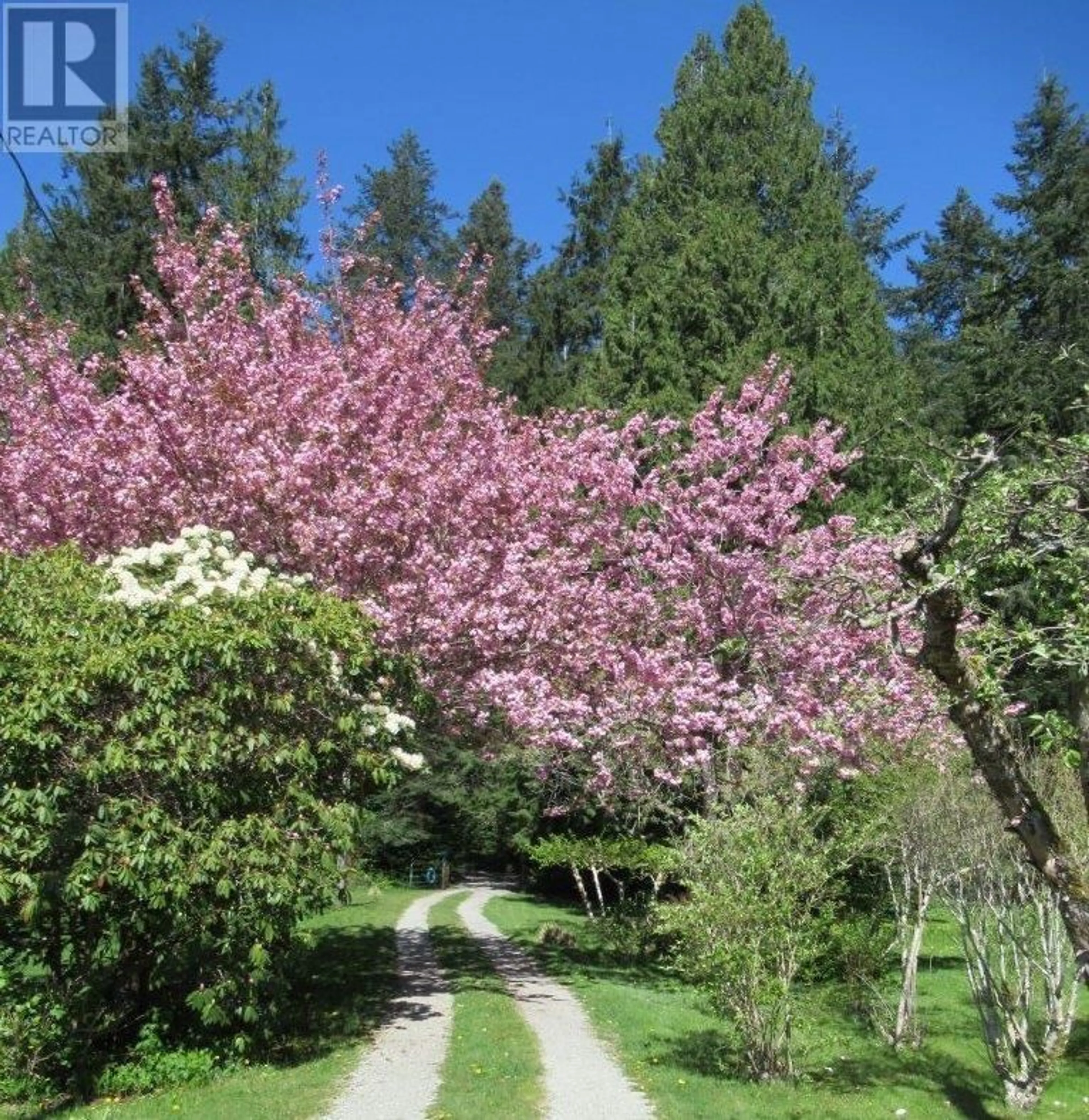 A pic from outside/outdoor area/front of a property/back of a property/a pic from drone, street for 1308 BURNS ROAD, Gibsons British Columbia V0N1V1