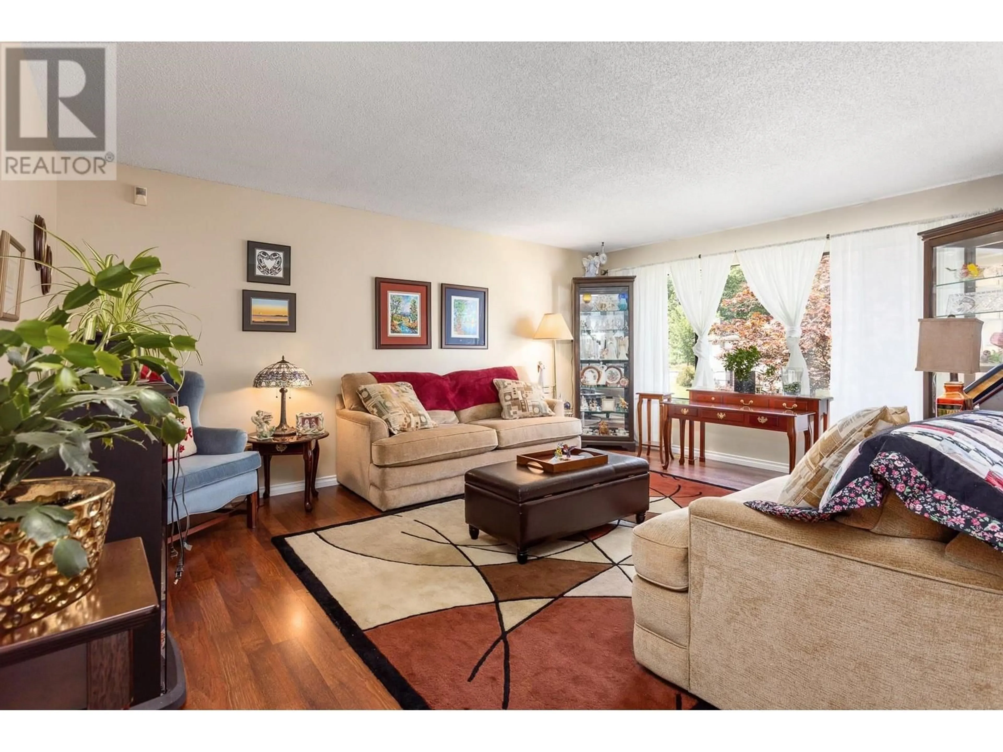 Living room with furniture, wood/laminate floor for 2160 DORSET AVENUE, Port Coquitlam British Columbia V3B5B9