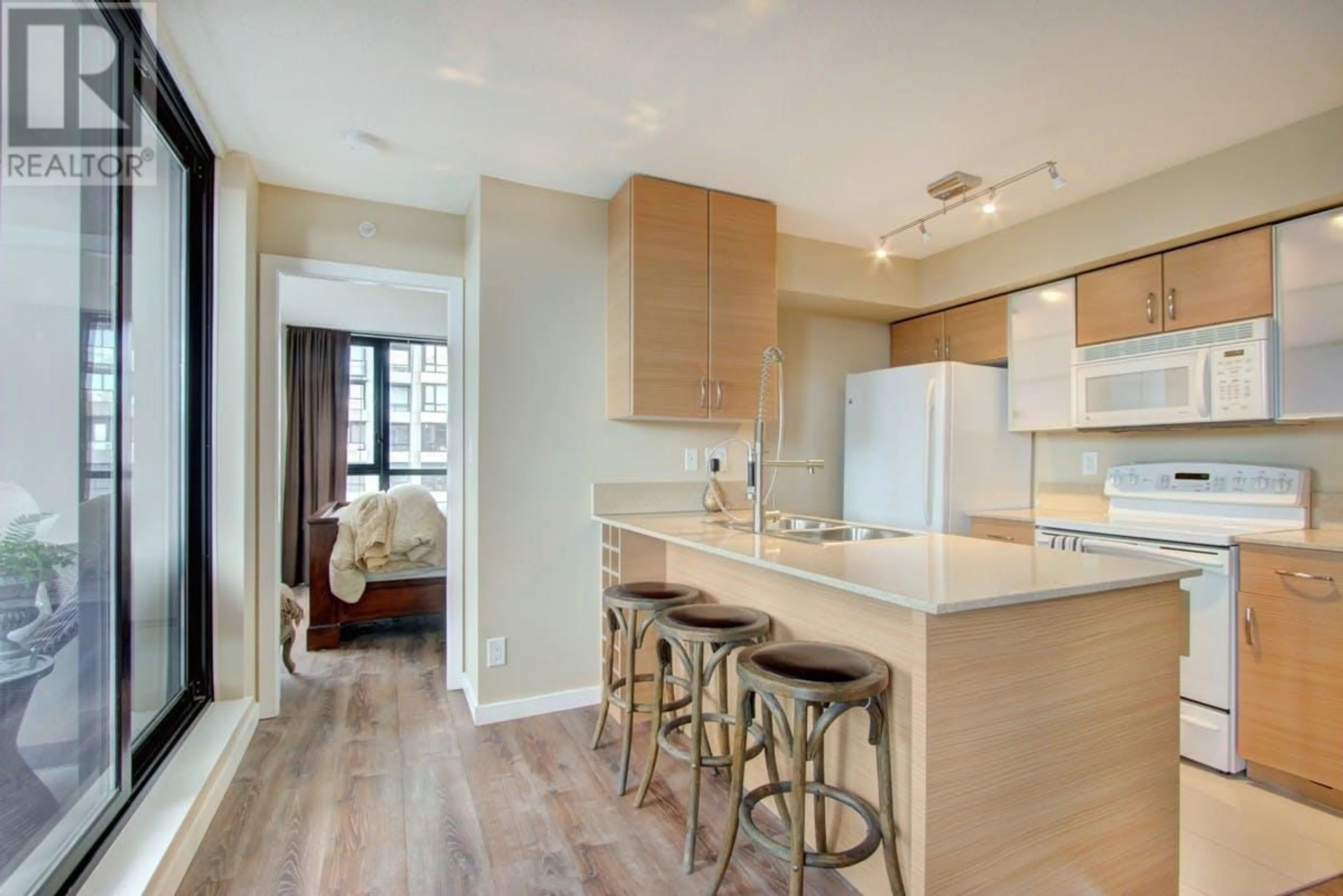 Open concept kitchen, unknown for 2702 977 MAINLAND STREET, Vancouver British Columbia V6B1T2