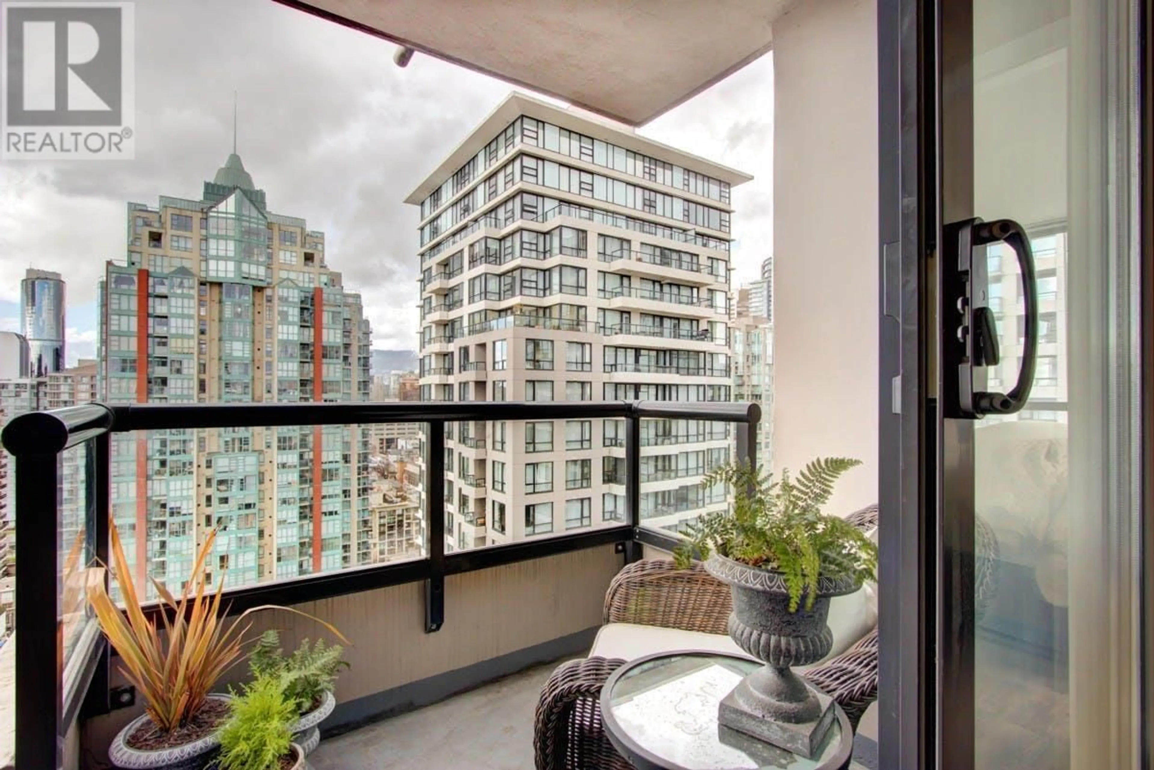 Balcony in the apartment, city buildings view from balcony for 2702 977 MAINLAND STREET, Vancouver British Columbia V6B1T2