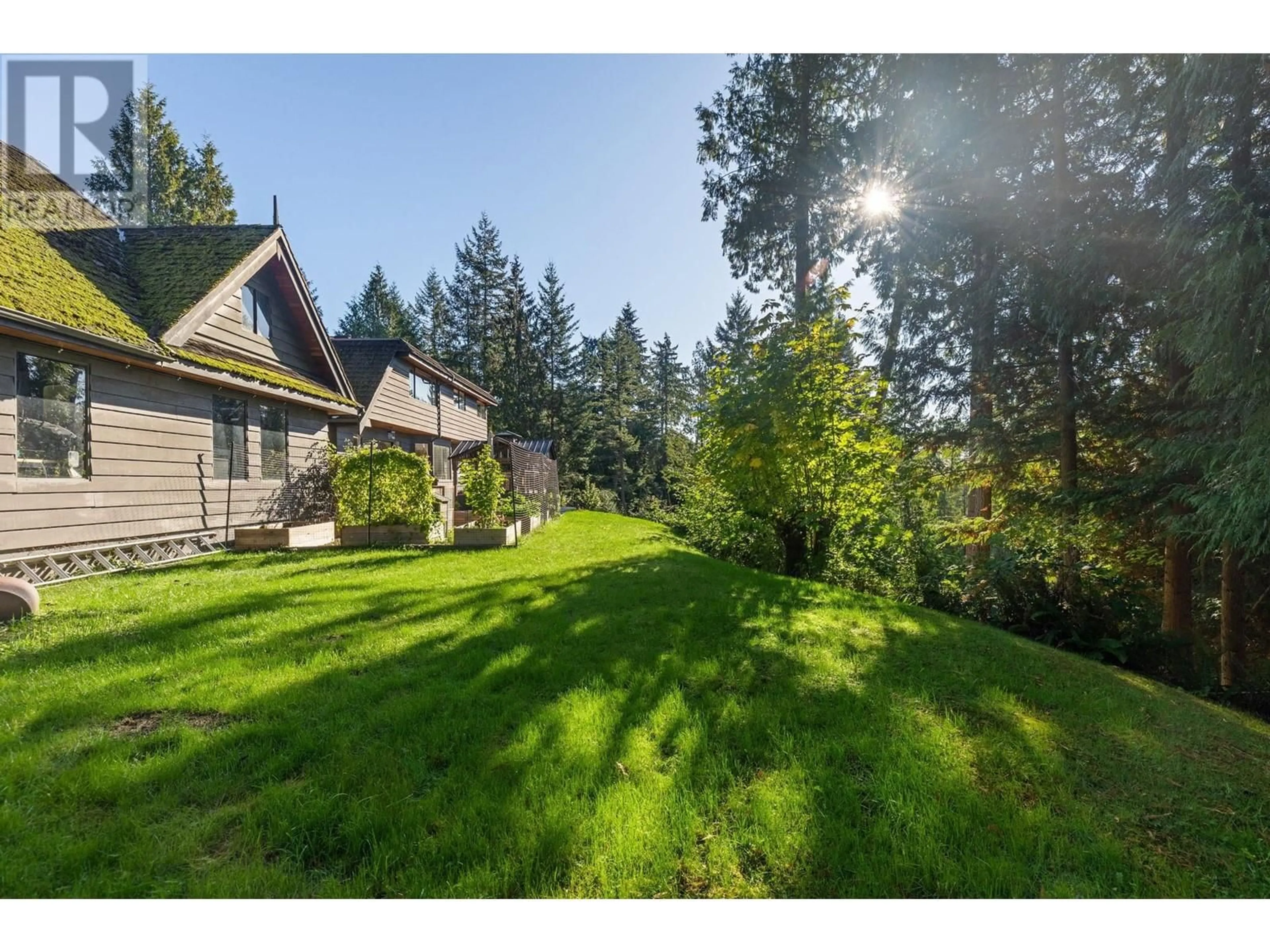 A pic from outside/outdoor area/front of a property/back of a property/a pic from drone, forest/trees view for 4286 ROCKEND PLACE, West Vancouver British Columbia V7W1A1