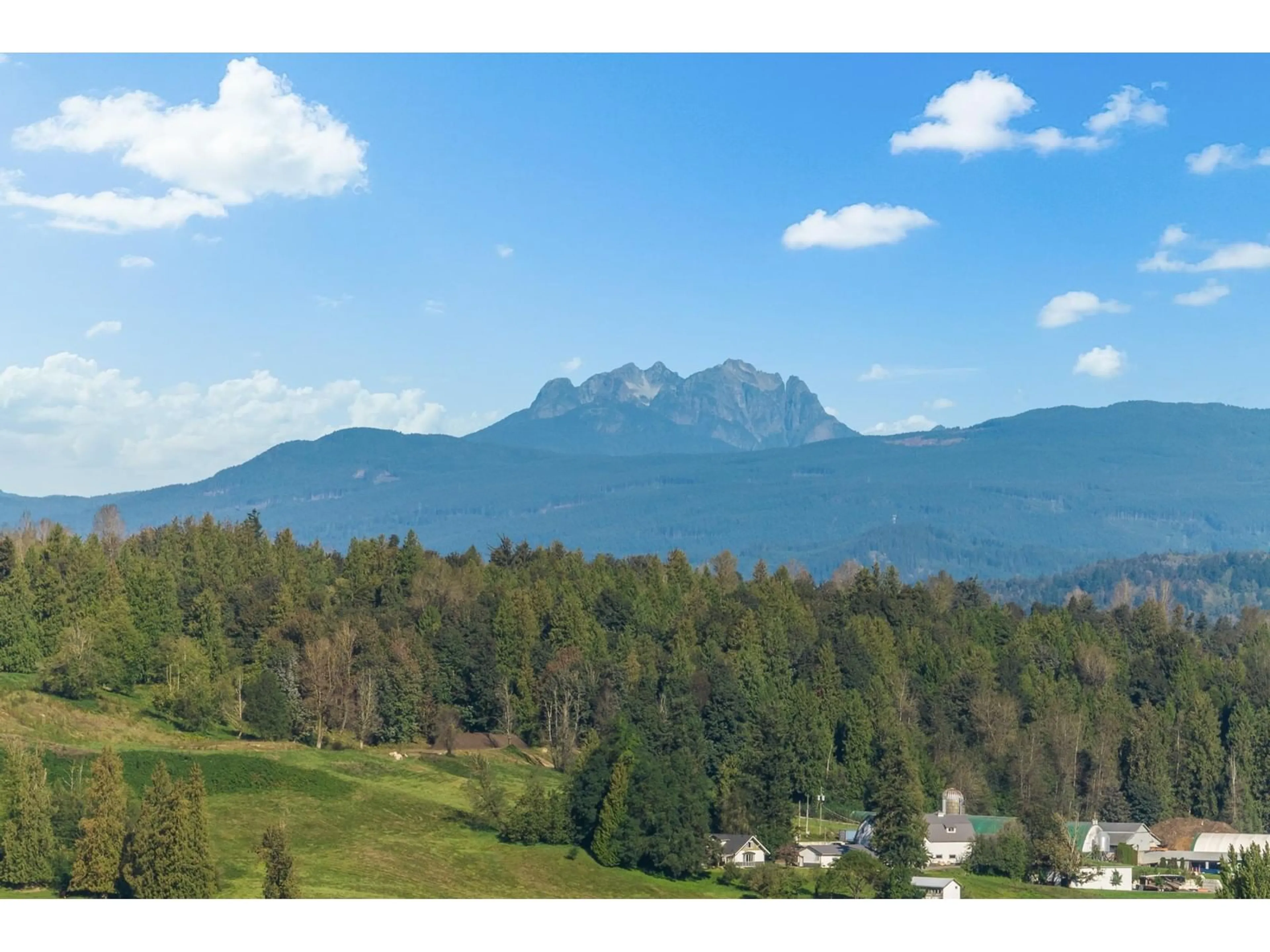 A pic from outside/outdoor area/front of a property/back of a property/a pic from drone, mountain view for 4610 BATES ROAD, Abbotsford British Columbia V4X1Z9