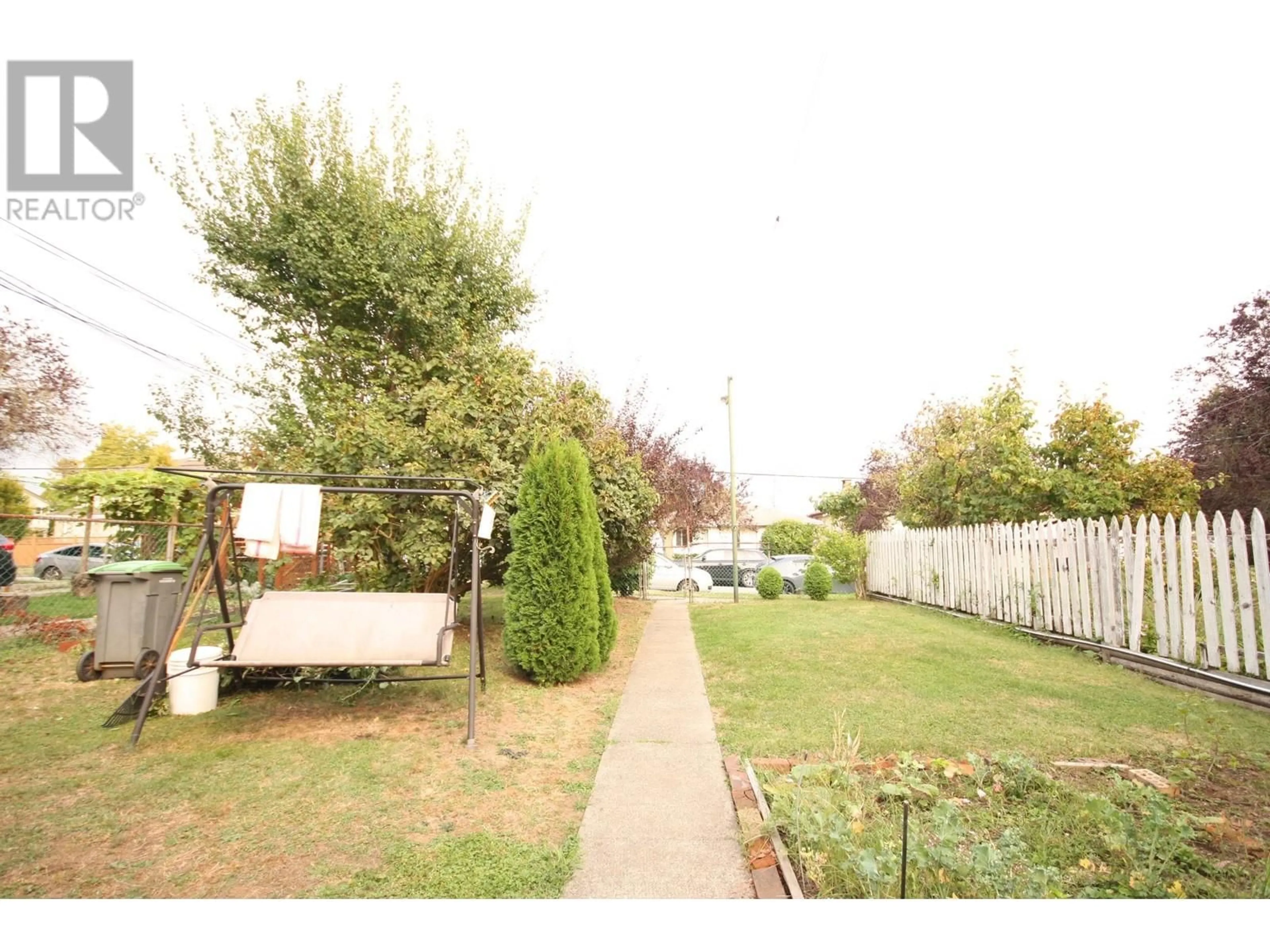 A pic from outside/outdoor area/front of a property/back of a property/a pic from drone, street for 5011 CHATHAM STREET, Vancouver British Columbia V5R3Z2
