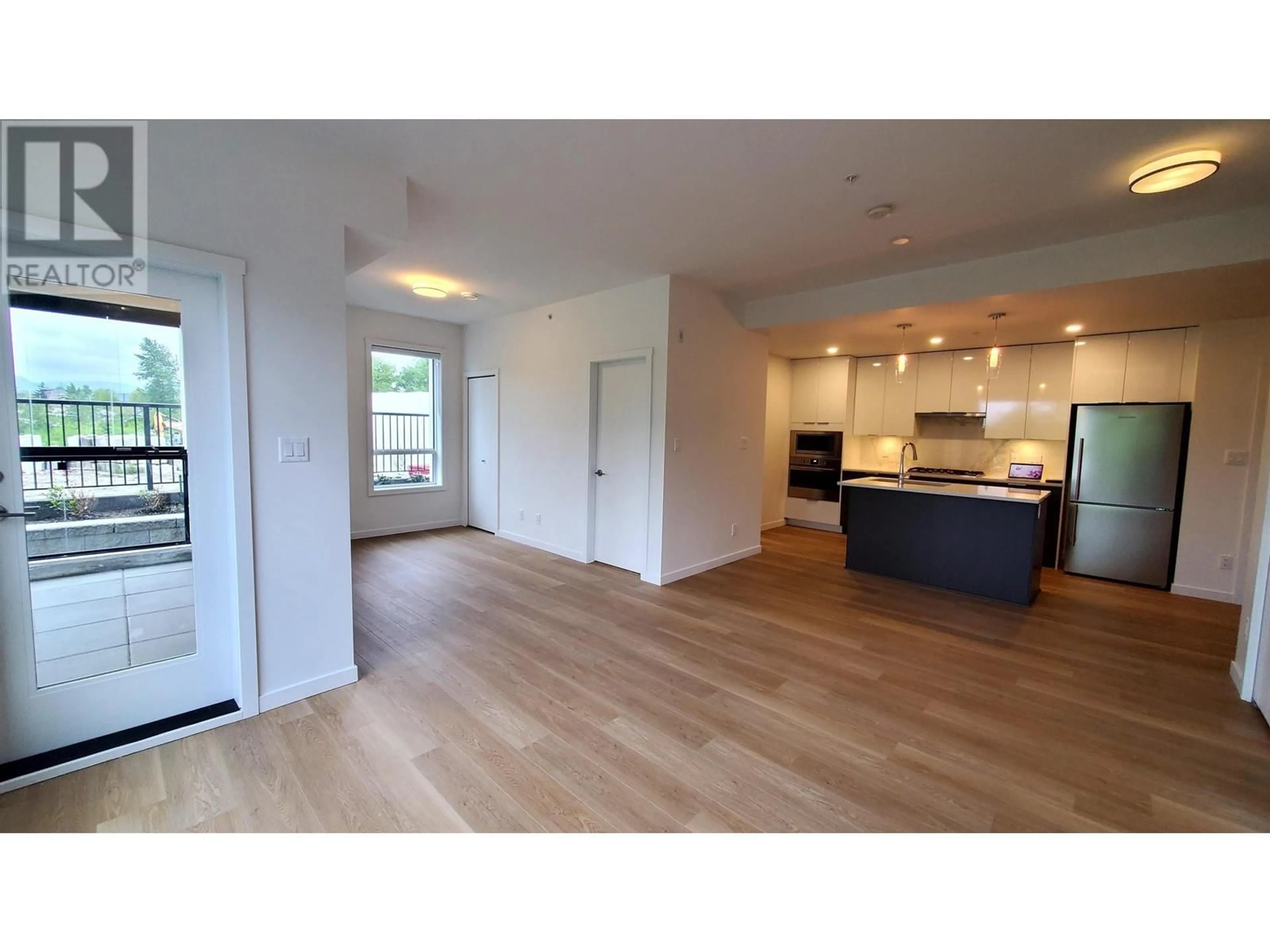 Open concept kitchen, wood/laminate floor for 116 - 11641 227 STREET, Maple Ridge British Columbia V2X9J6