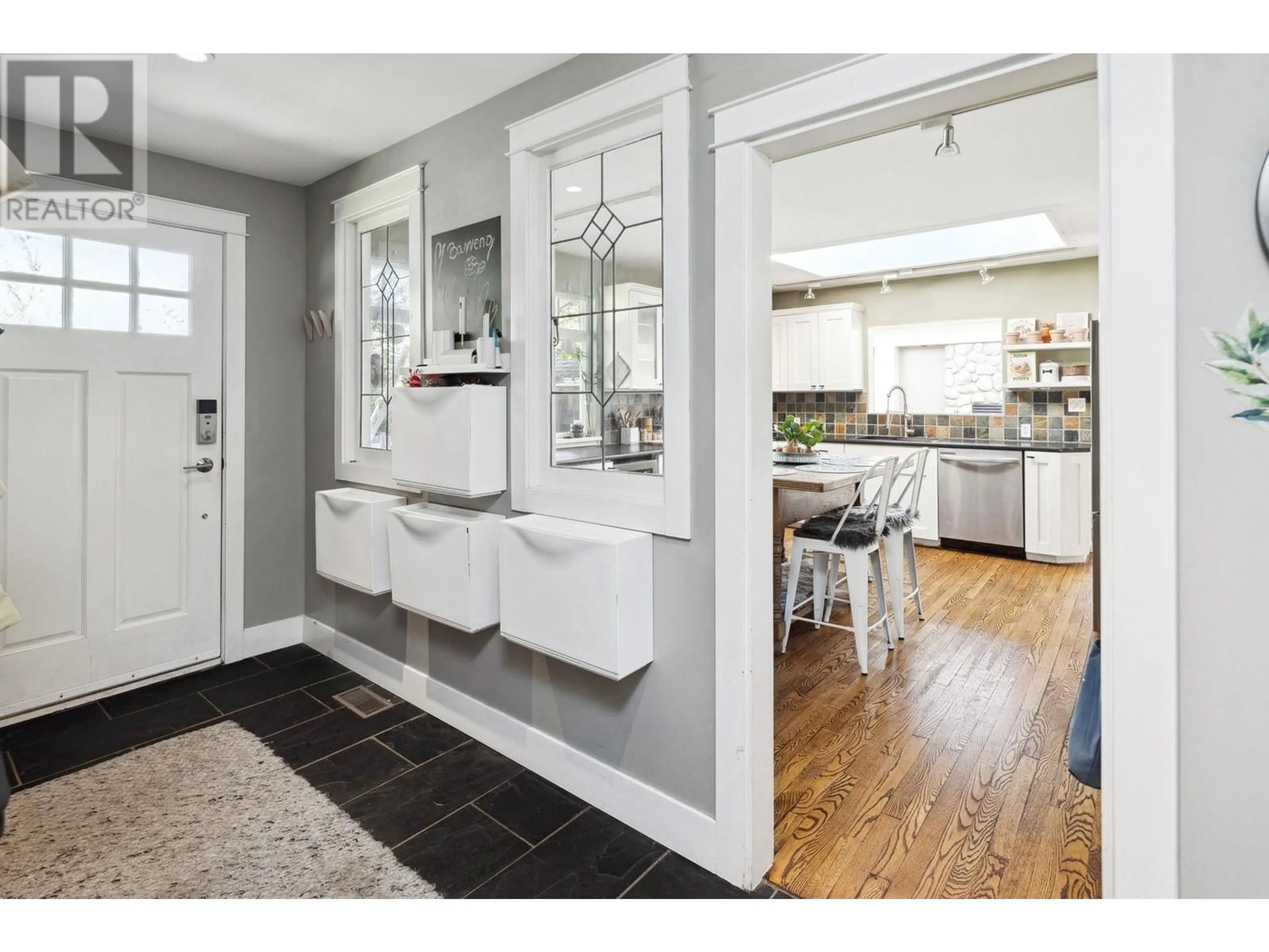 Open concept kitchen, ceramic/tile floor for 4874 11A AVENUE, Delta British Columbia V4M1Z4