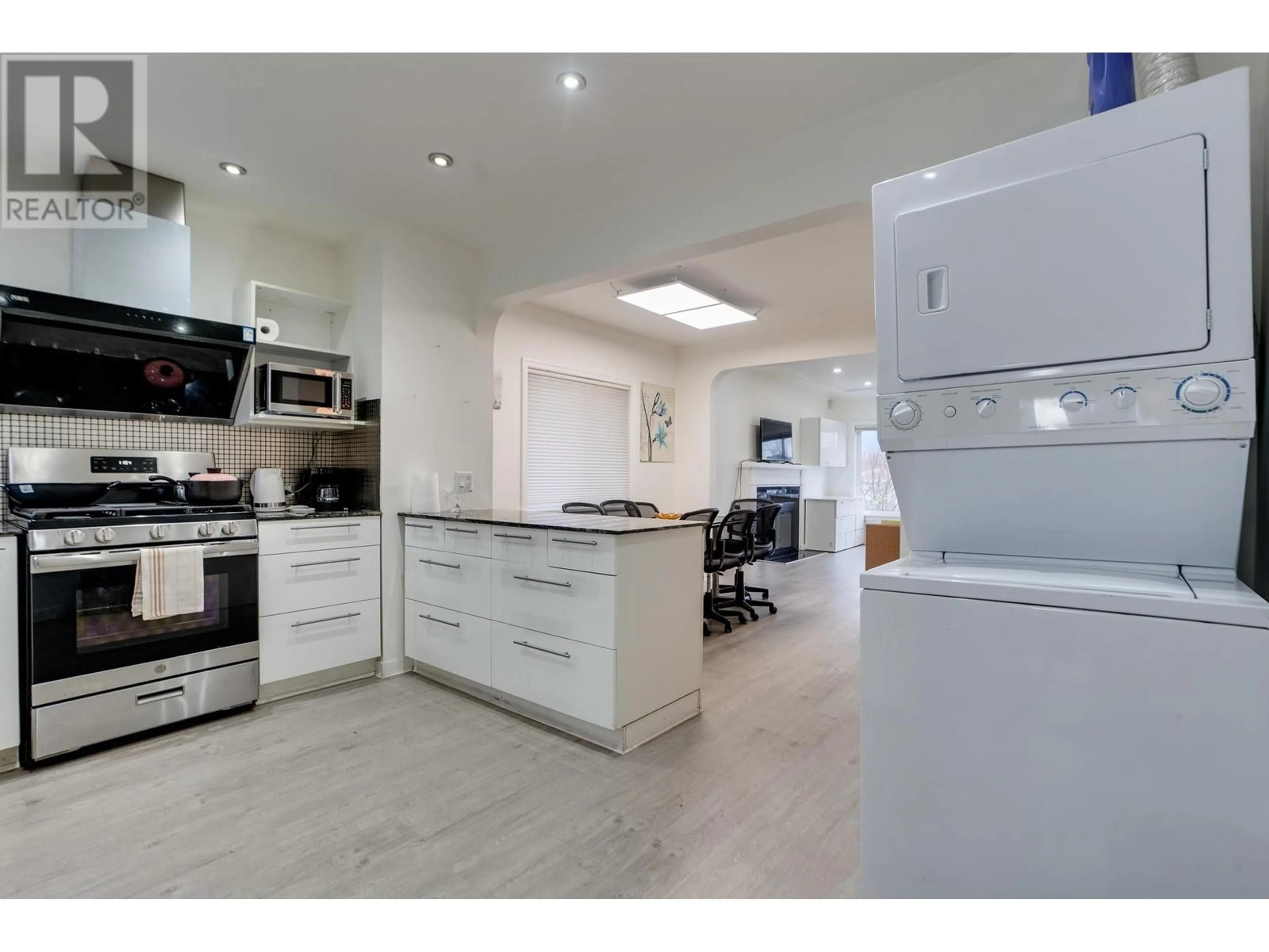 Open concept kitchen, ceramic/tile floor for 2682 NAPIER STREET, Vancouver British Columbia V5K2W6