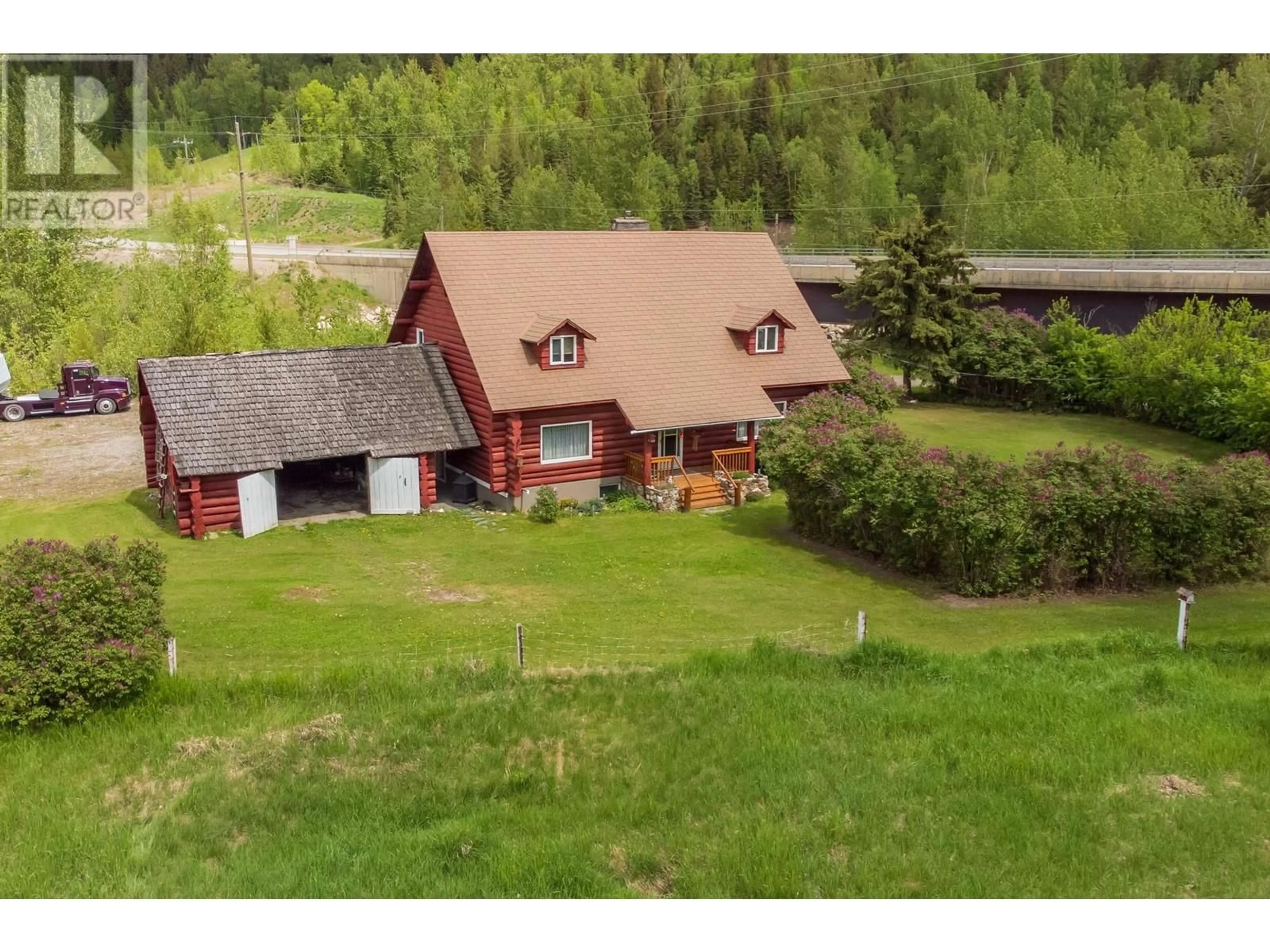 A pic from outside/outdoor area/front of a property/back of a property/a pic from drone, mountain view for 31815 CARIBOO HIGHWAY, Prince George British Columbia V2N5Z8