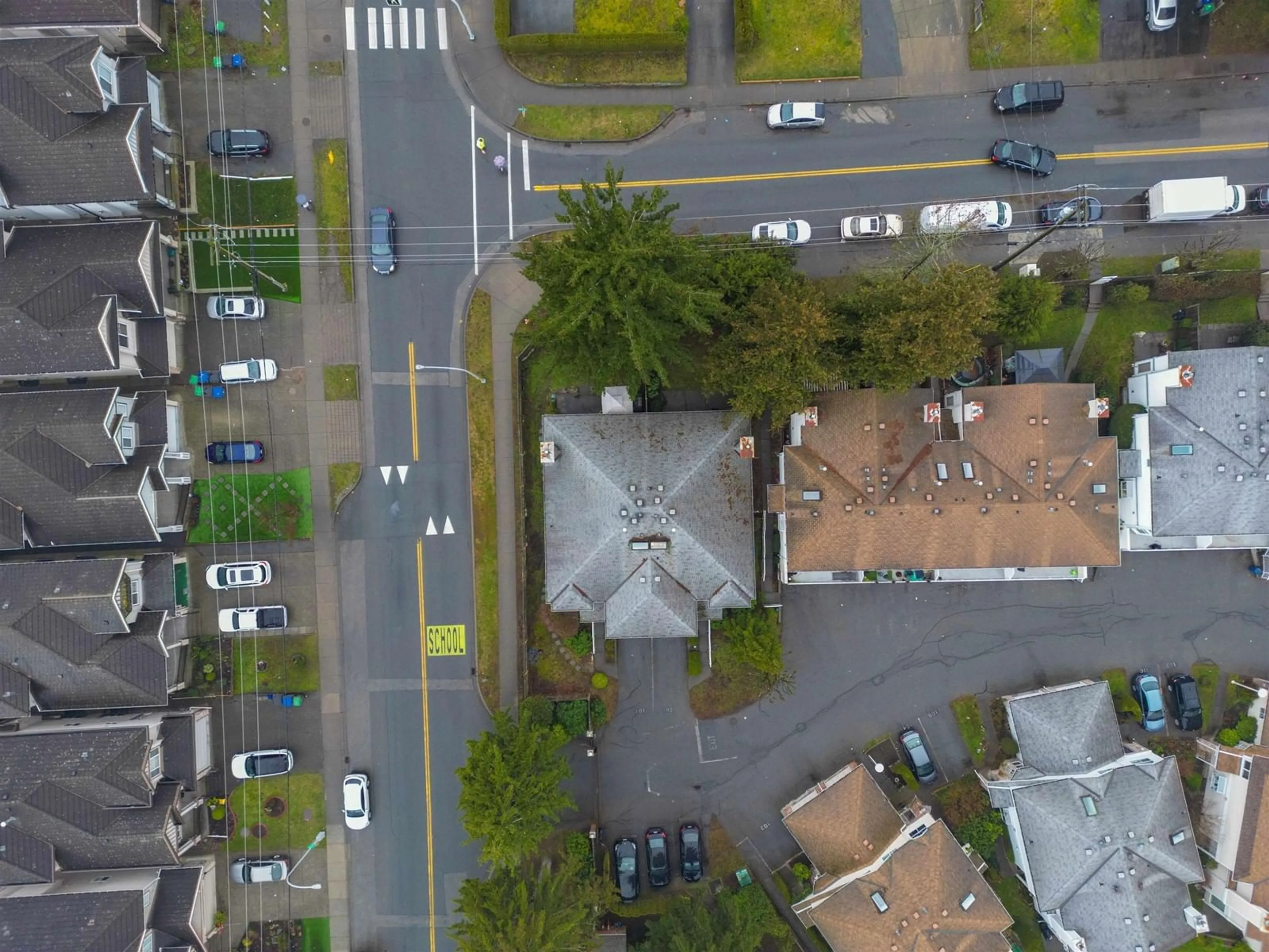 A pic from outside/outdoor area/front of a property/back of a property/a pic from drone, street for 102 12233 92 AVENUE, Surrey British Columbia V3V7R8