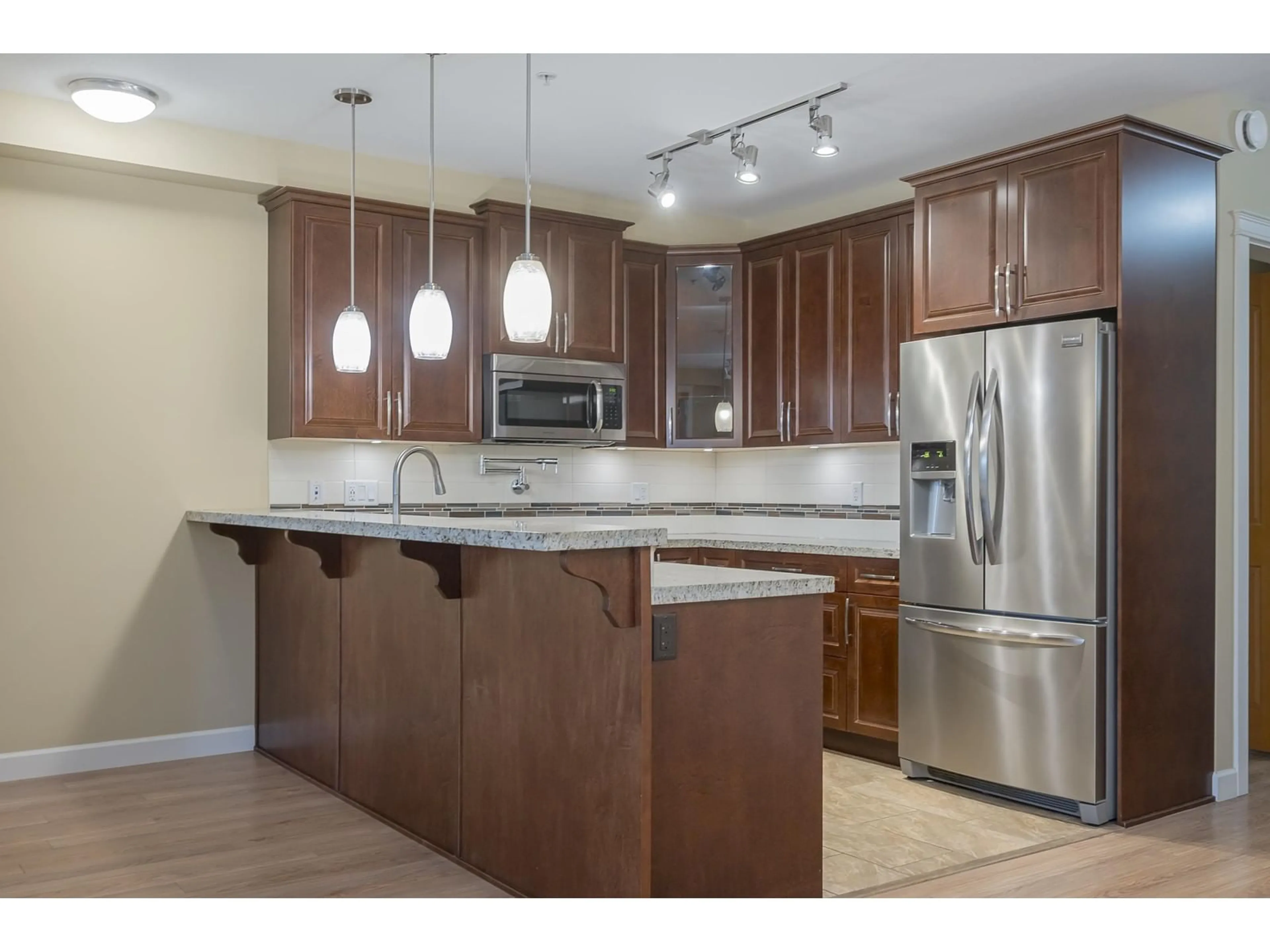 Open concept kitchen, unknown for 207 - 8157 207, Langley British Columbia V2Y0V4