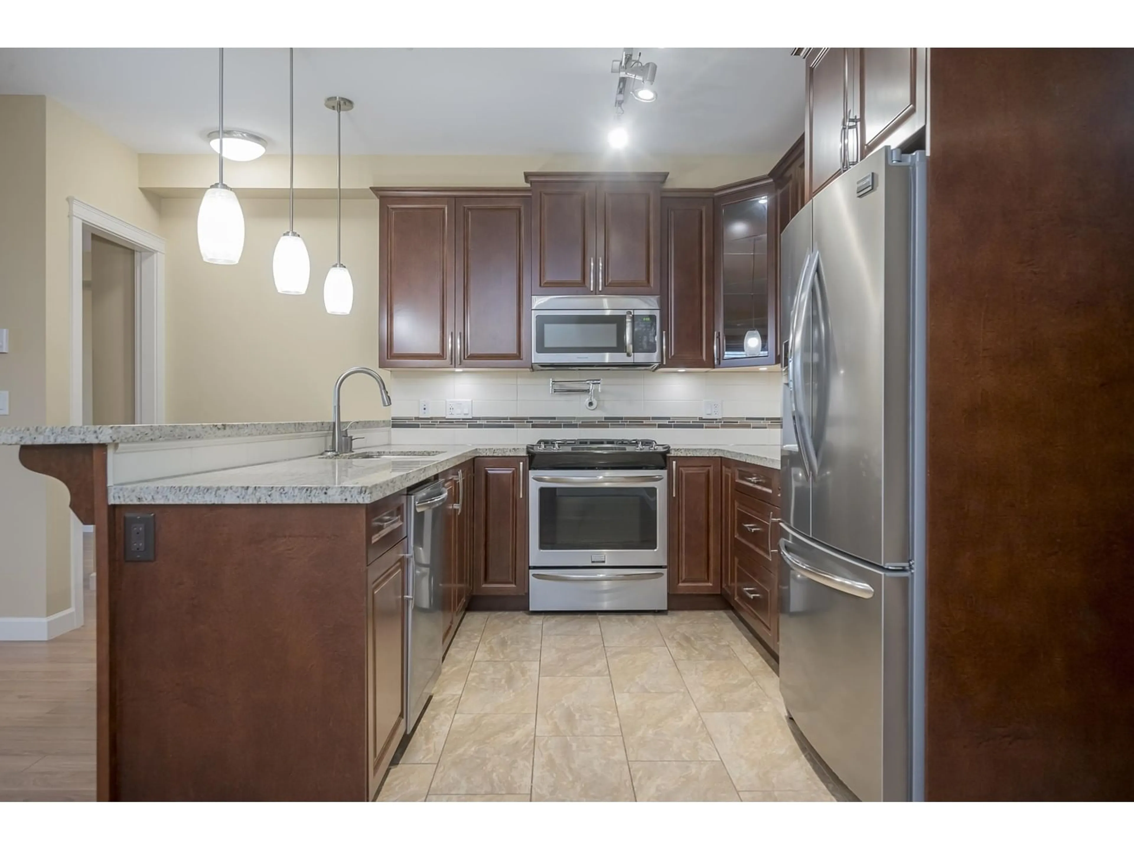 Standard kitchen, ceramic/tile floor for 207 - 8157 207, Langley British Columbia V2Y0V4