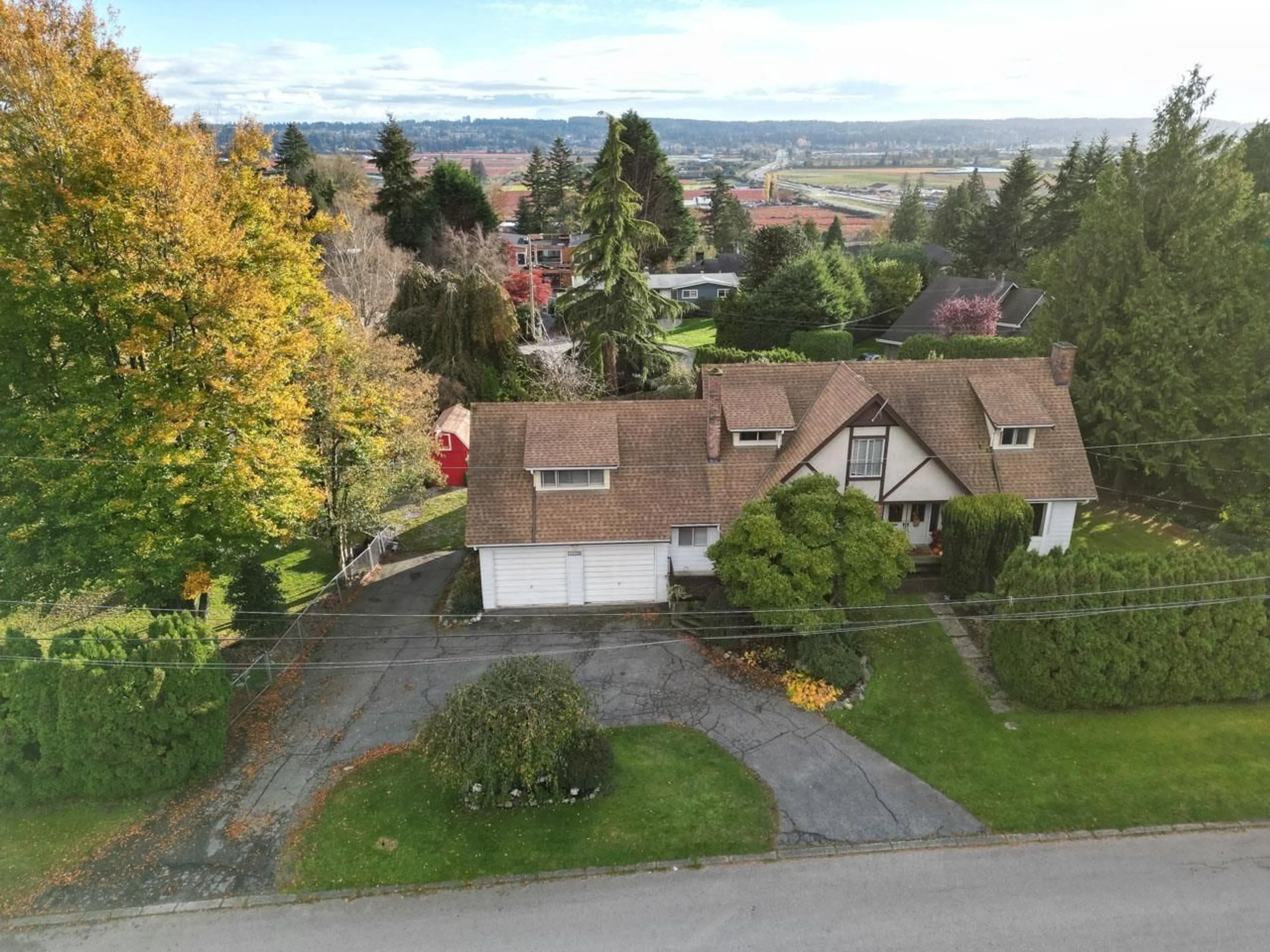 A pic from outside/outdoor area/front of a property/back of a property/a pic from drone, unknown for 14728 55 AVENUE, Surrey British Columbia V3S1A9