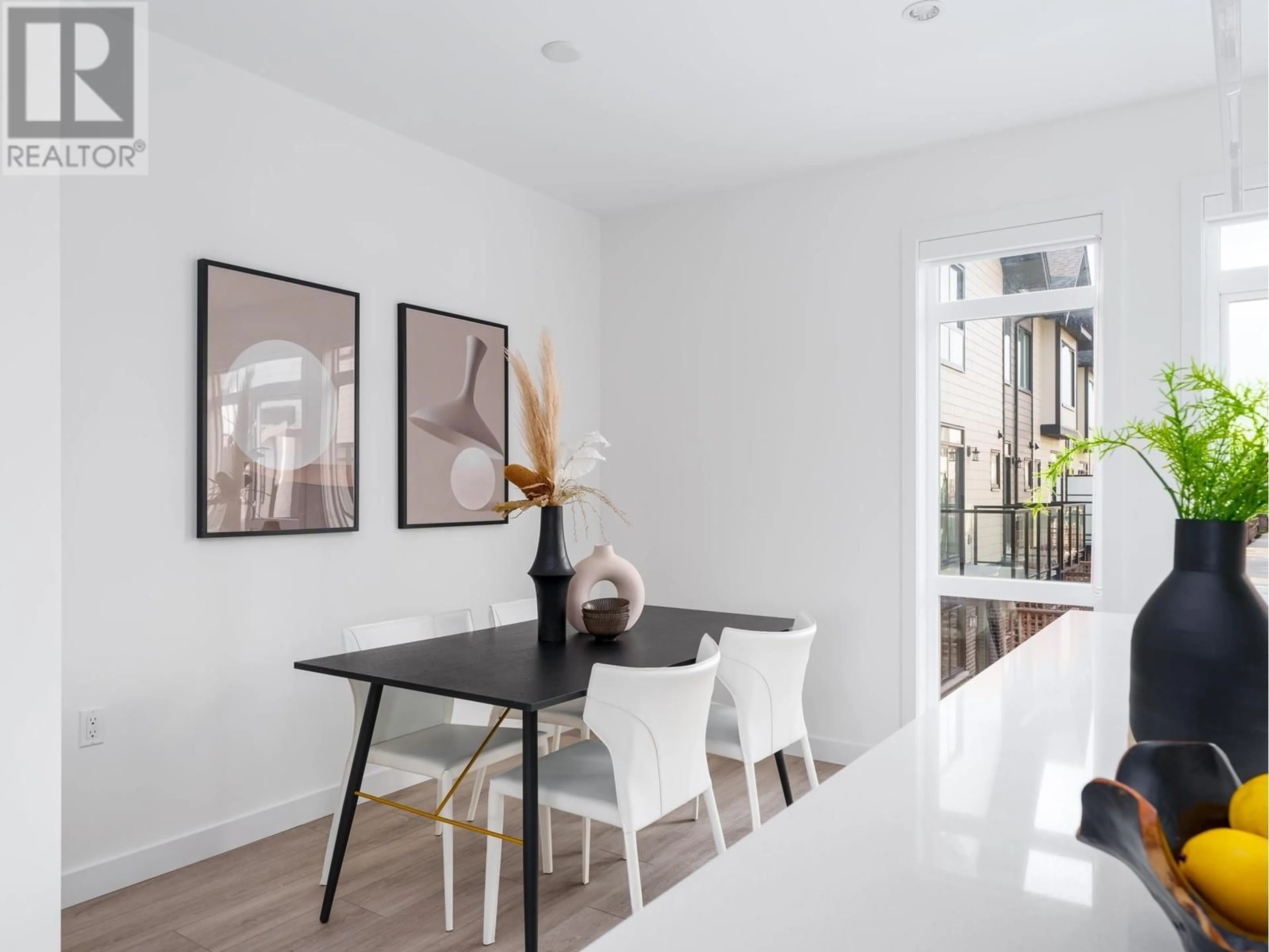 Dining room, wood/laminate floor for 18 - 4337 BOUNDARY ROAD, Richmond British Columbia V6V1S8