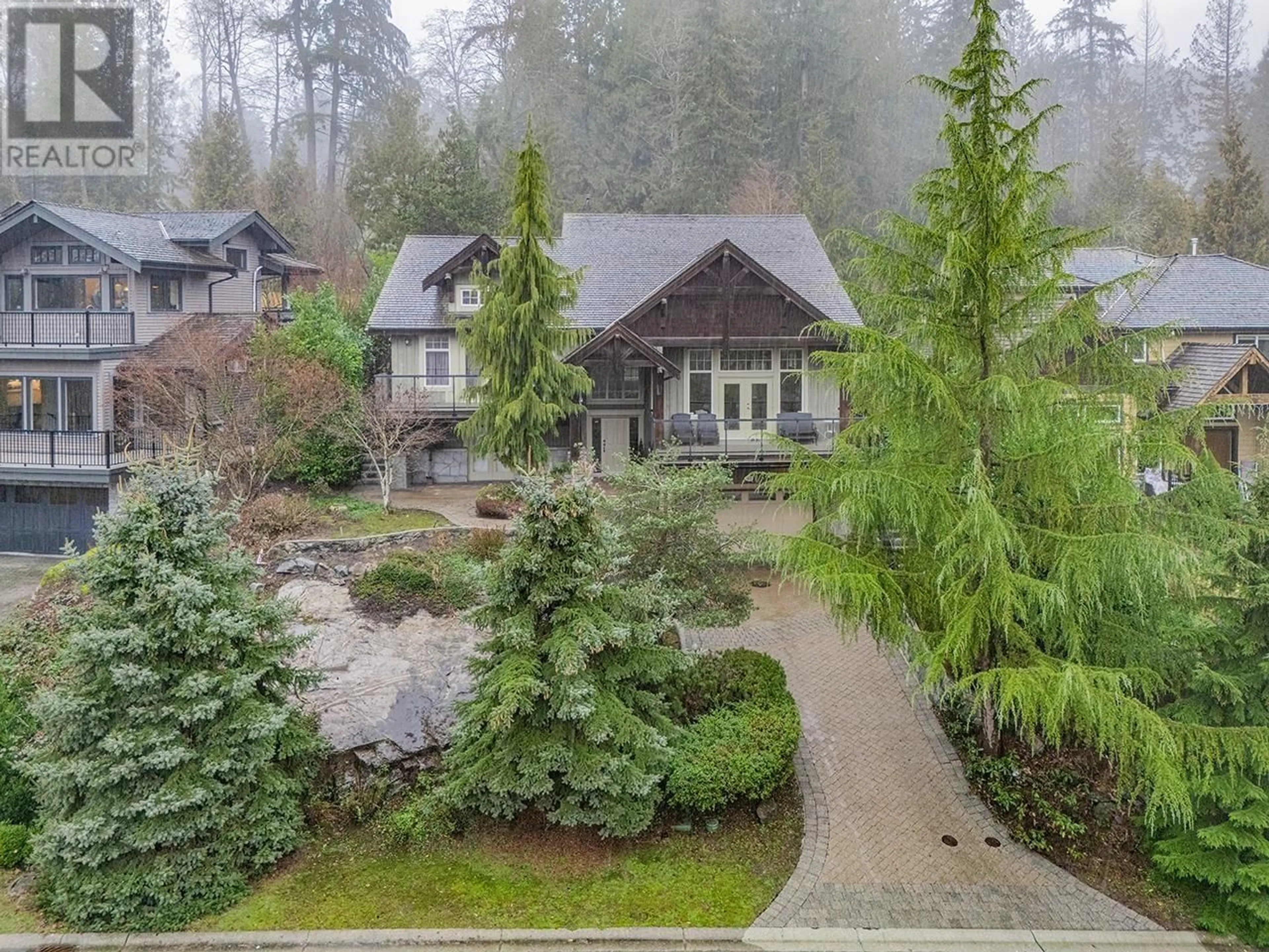 A pic from outside/outdoor area/front of a property/back of a property/a pic from drone, forest/trees view for 3420 ANNE MACDONALD WAY, North Vancouver British Columbia V7G2S7