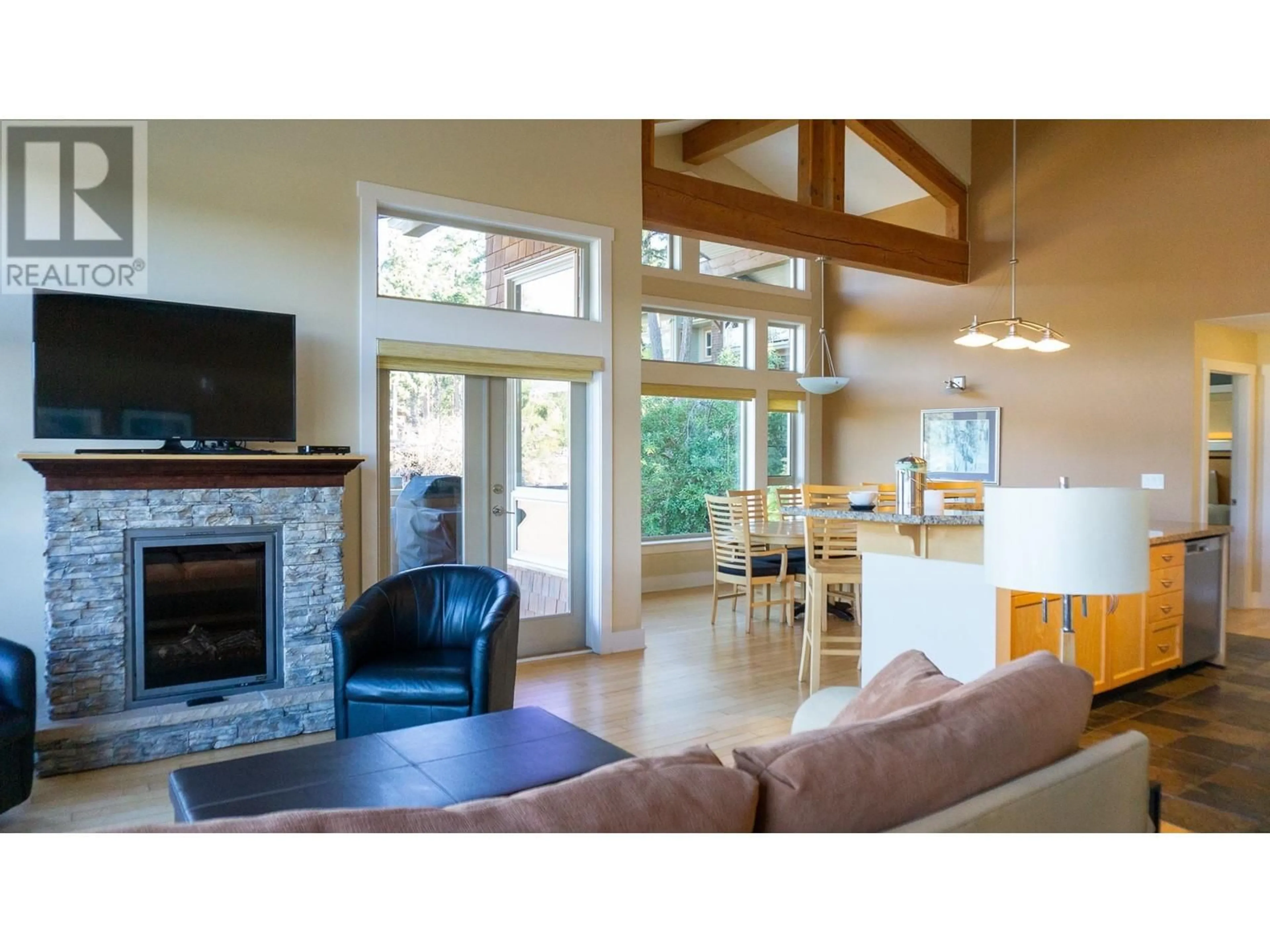 Living room with furniture, wood/laminate floor for 6A 12849 LAGOON ROAD, Madeira Park British Columbia V0N2H1