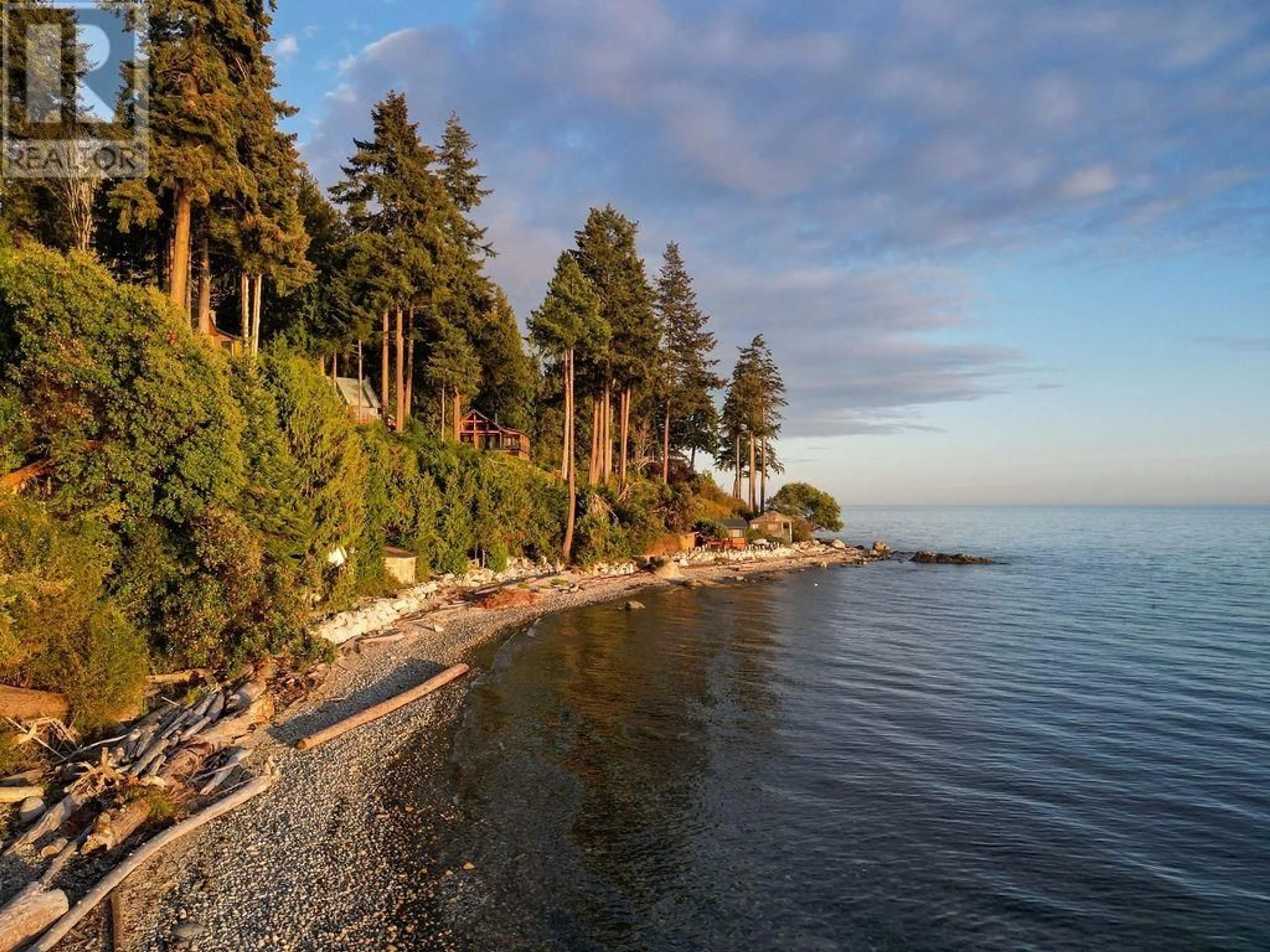 A pic from outside/outdoor area/front of a property/back of a property/a pic from drone, water/lake/river/ocean view for 3387 BEACH AVENUE, Roberts Creek British Columbia V0N2W2