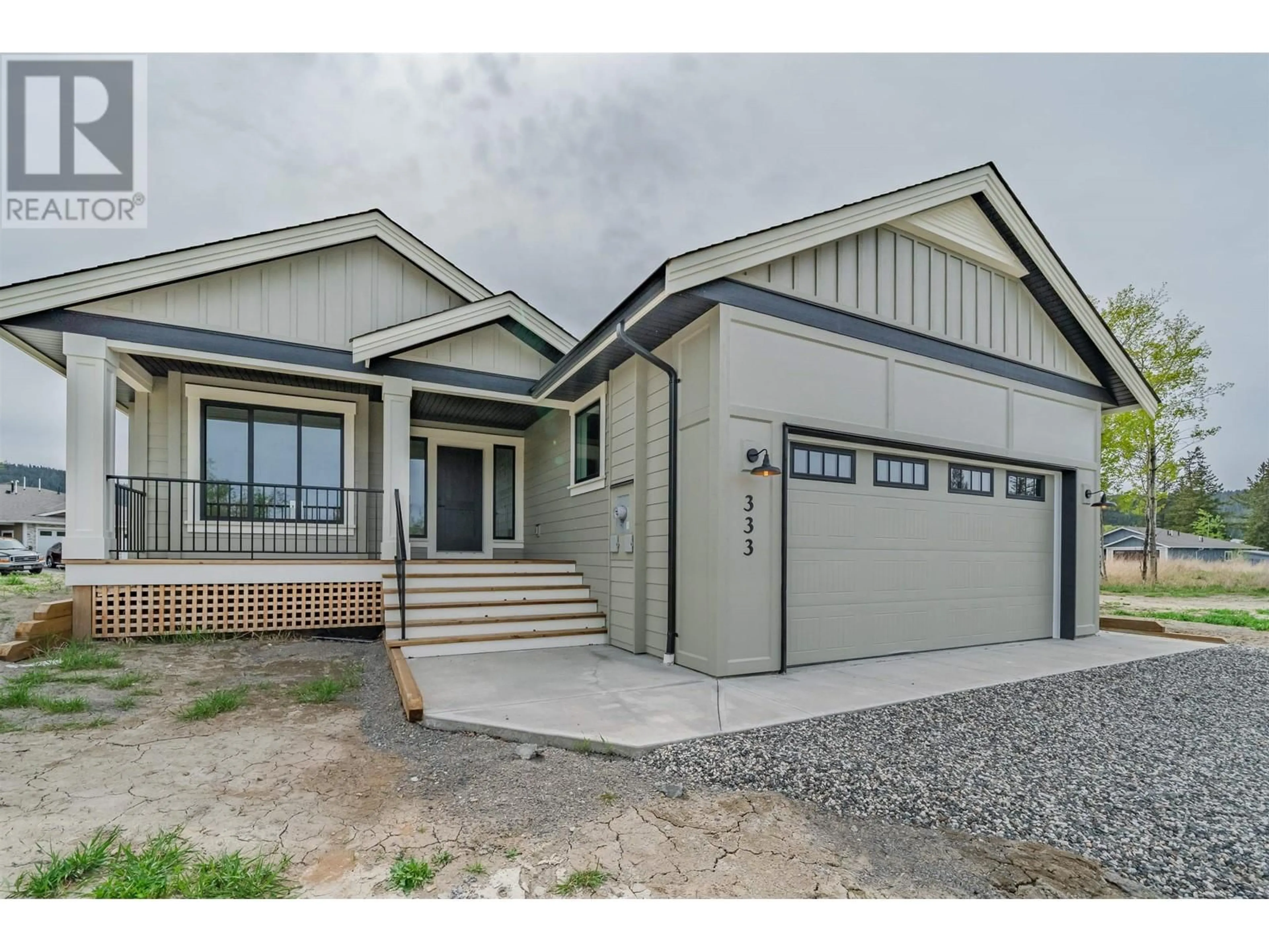 Home with vinyl exterior material, street for 333 SANDHILL CRESCENT, 100 Mile House British Columbia V0K2E0