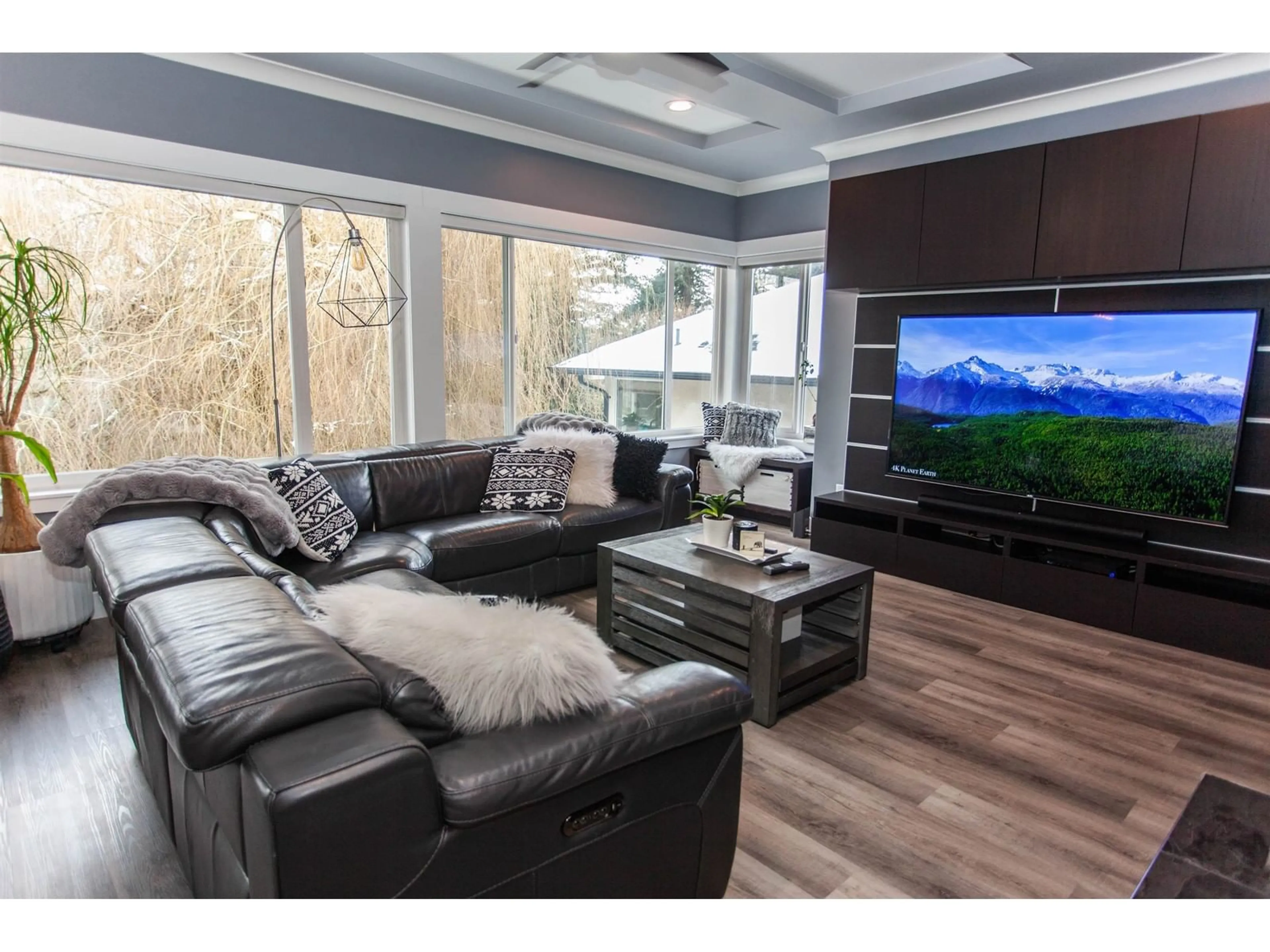 Living room with furniture, wood/laminate floor for 2787 ST MORITZ WAY, Abbotsford British Columbia V3G1C3