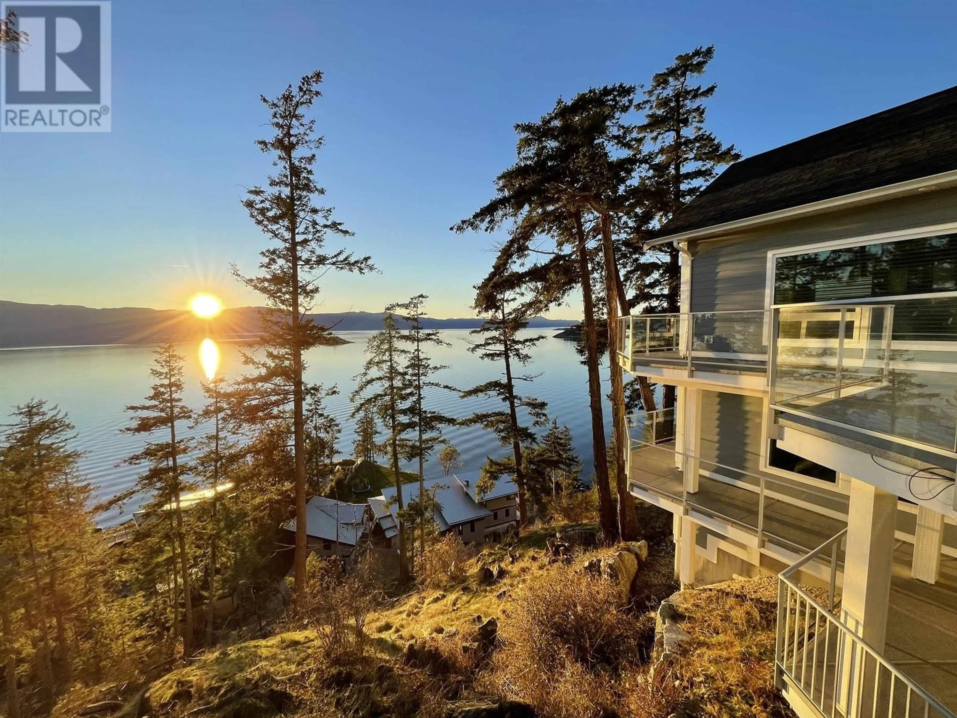 A pic from outside/outdoor area/front of a property/back of a property/a pic from drone, water/lake/river/ocean view for 4177 PACKALEN BOULEVARD, Garden Bay British Columbia V0N1S1