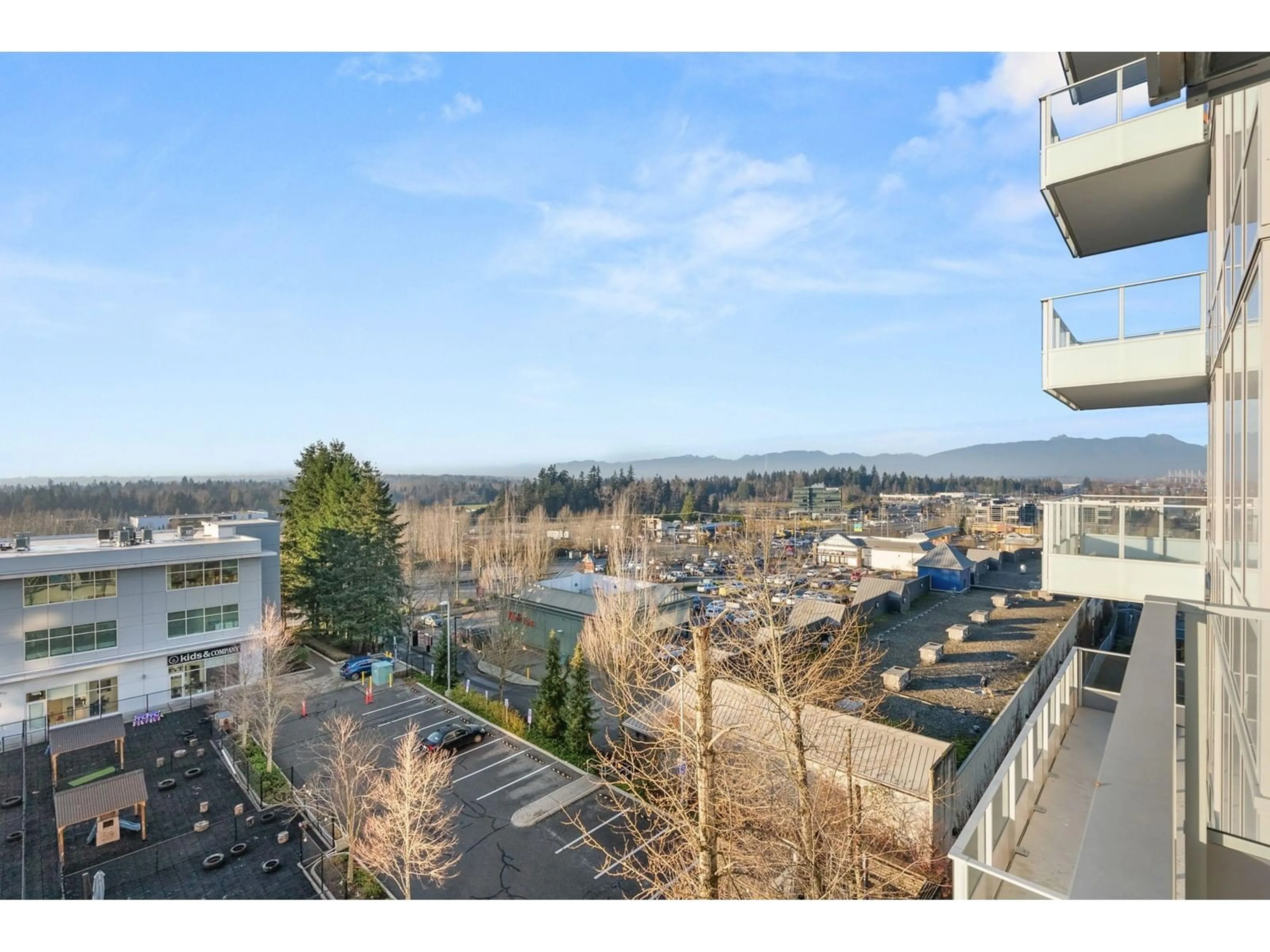 A pic from outside/outdoor area/front of a property/back of a property/a pic from drone, city buildings view from balcony for 502 20065 85 AVENUE, Langley British Columbia V2Y3Y4