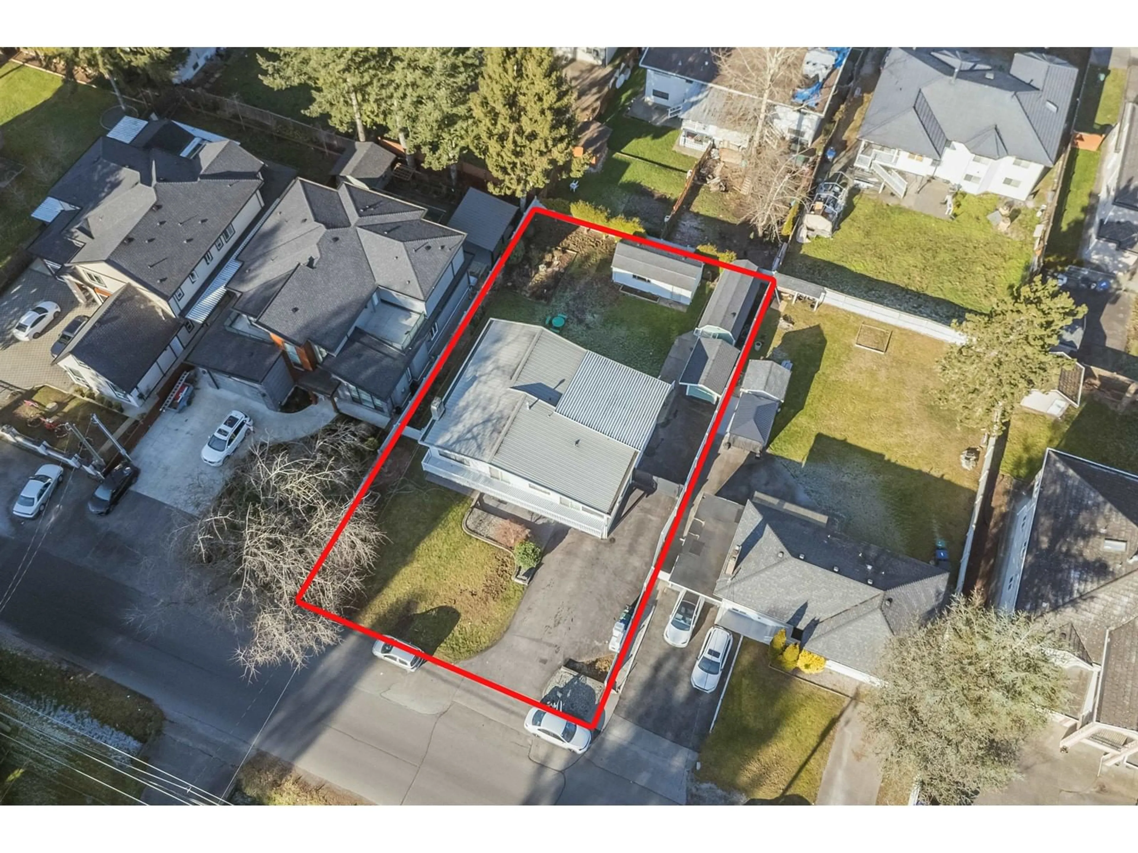 A pic from outside/outdoor area/front of a property/back of a property/a pic from drone, street for 12145 97 AVENUE, Surrey British Columbia V3V2C8