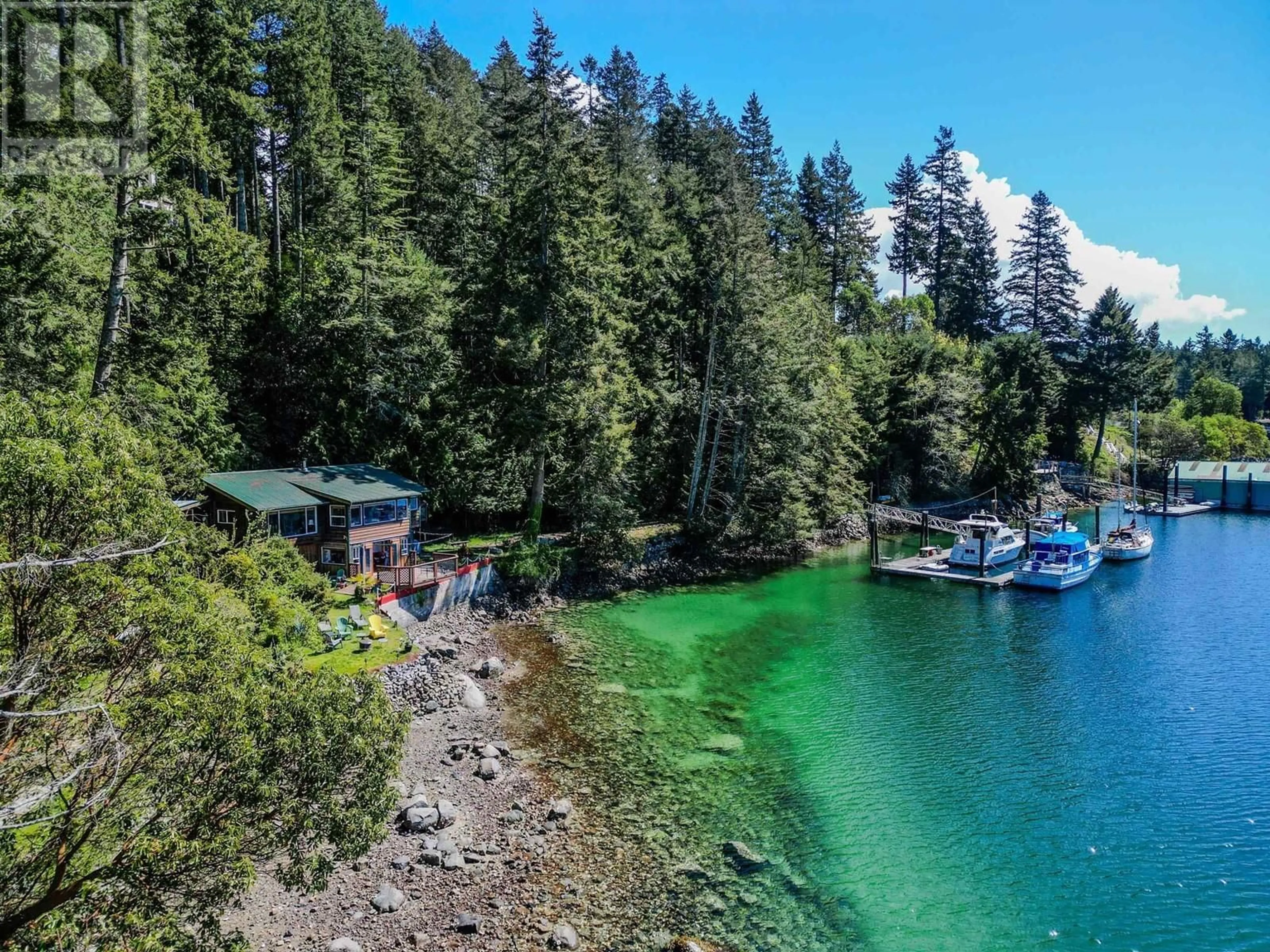 A pic from outside/outdoor area/front of a property/back of a property/a pic from drone, water/lake/river/ocean view for 5446 SECRET COVE ROAD, Halfmoon Bay British Columbia V7Z1B7