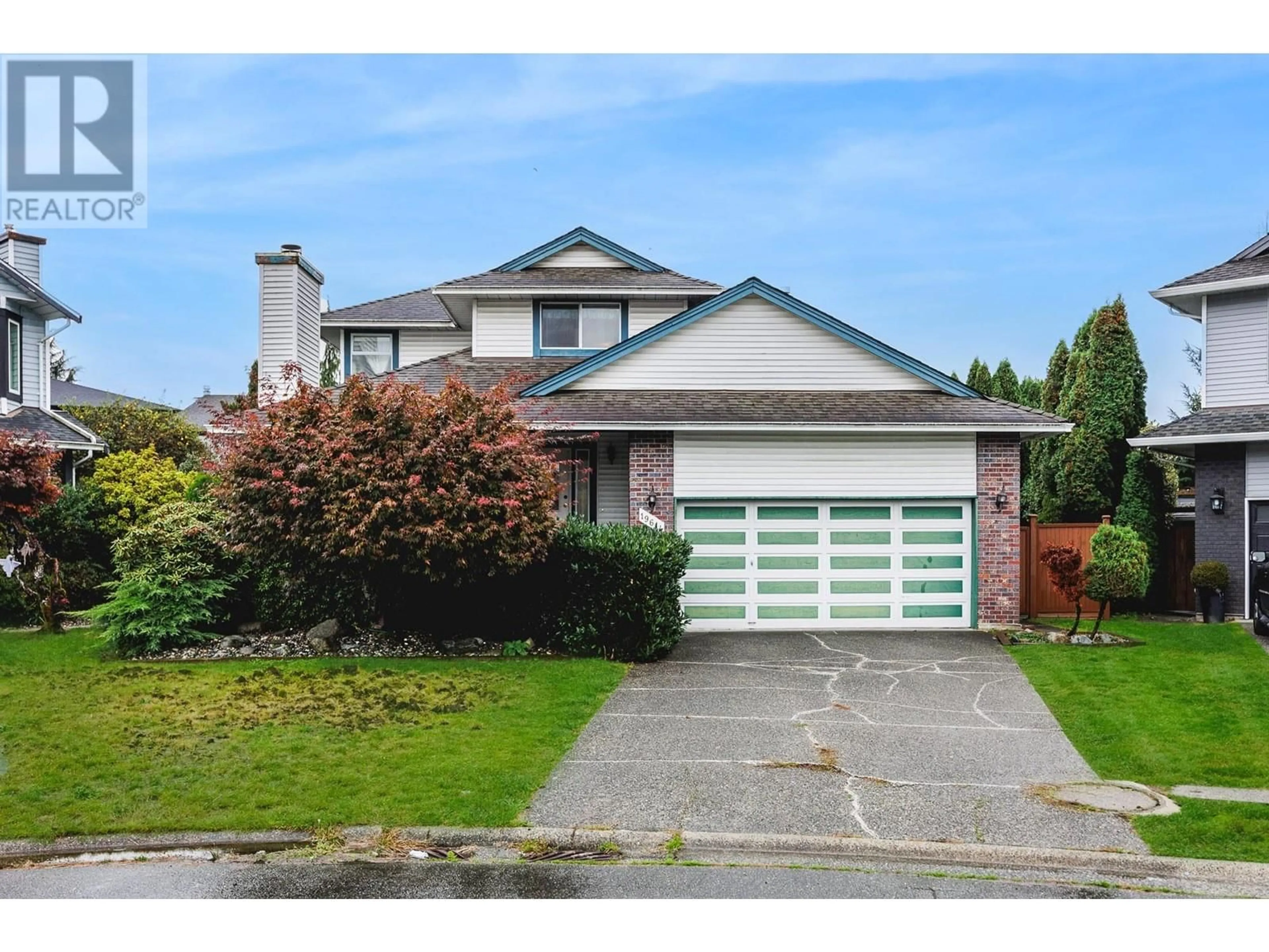 Home with vinyl exterior material, street for 19614 OAK TERRACE, Pitt Meadows British Columbia V3Y2A1