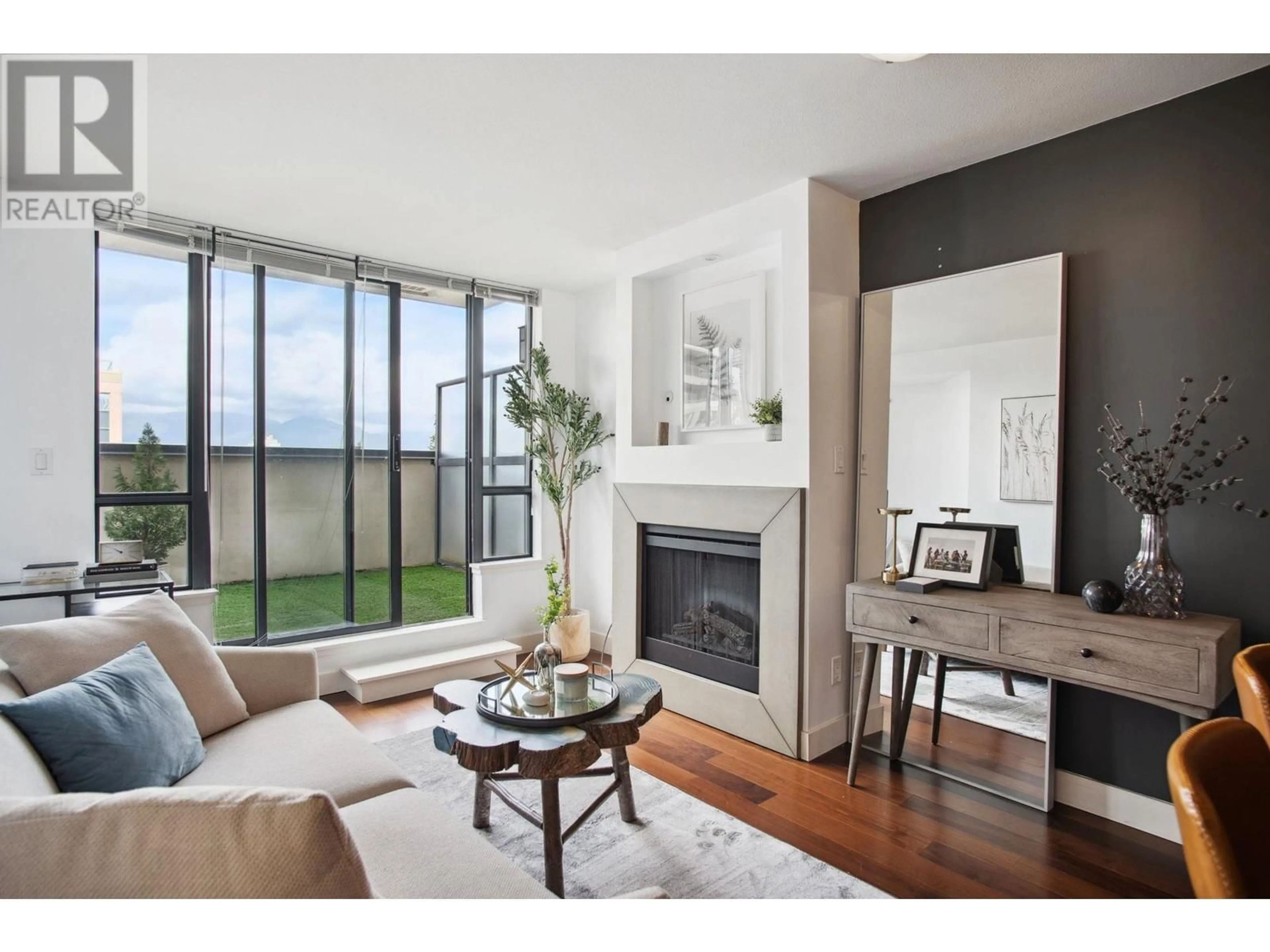 Living room with furniture, wood/laminate floor for 505 3228 TUPPER STREET, Vancouver British Columbia V5Z4S7