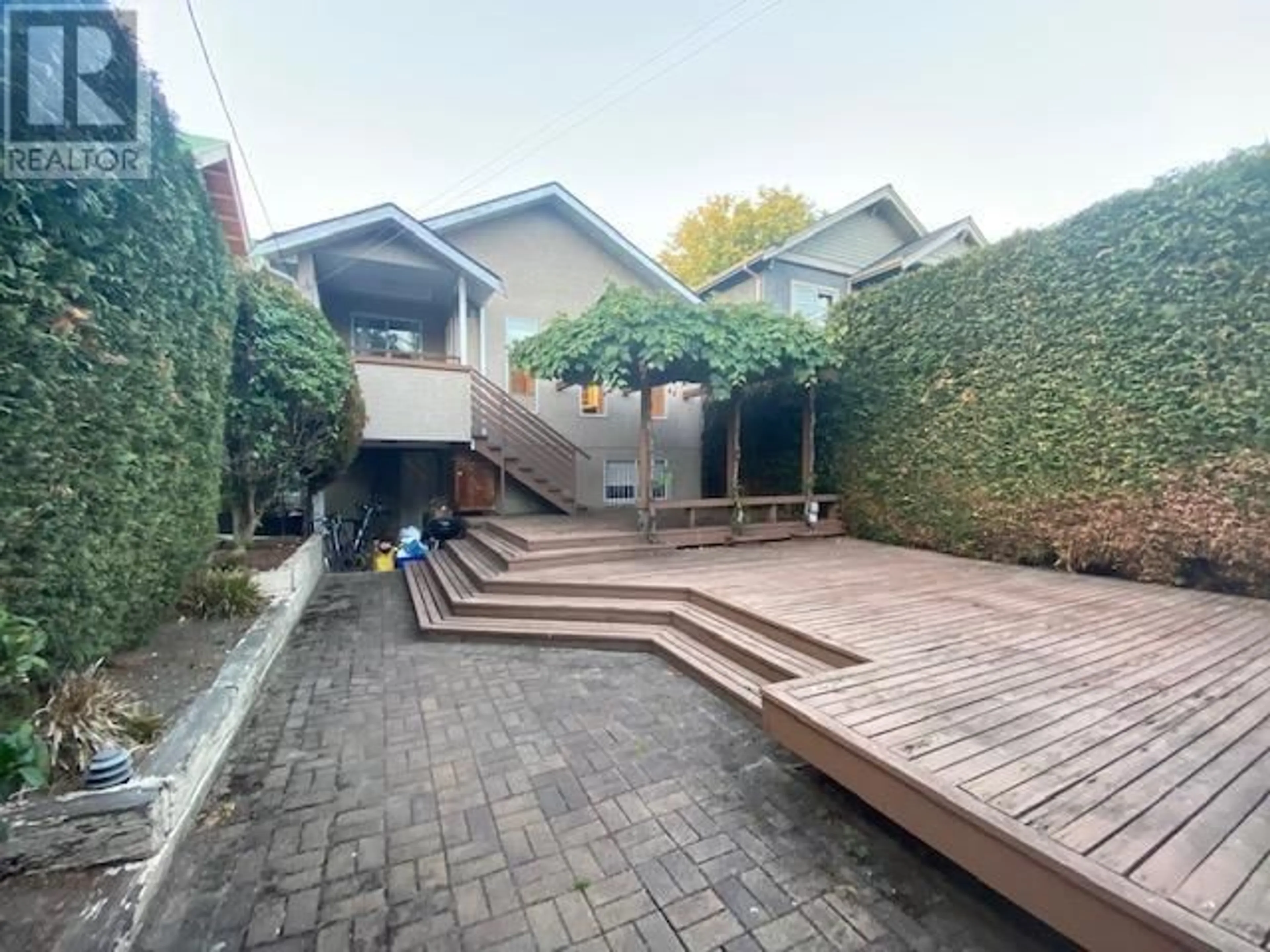 A pic from outside/outdoor area/front of a property/back of a property/a pic from drone, street for 3058 W 12TH AVENUE, Vancouver British Columbia V6K2R5