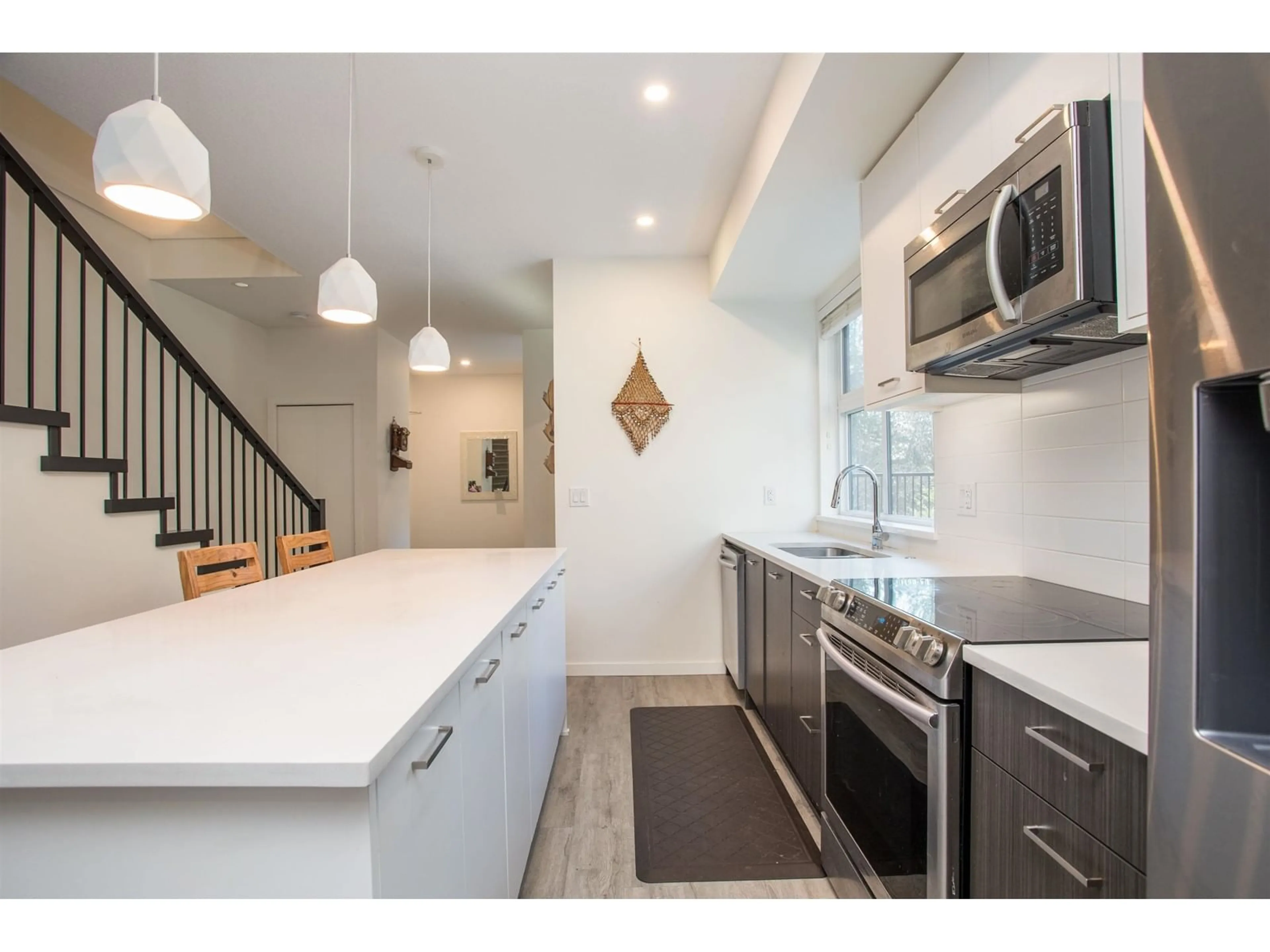 Open concept kitchen, ceramic/tile floor for B210 20087 68 AVENUE, Langley British Columbia V2Y0Y4