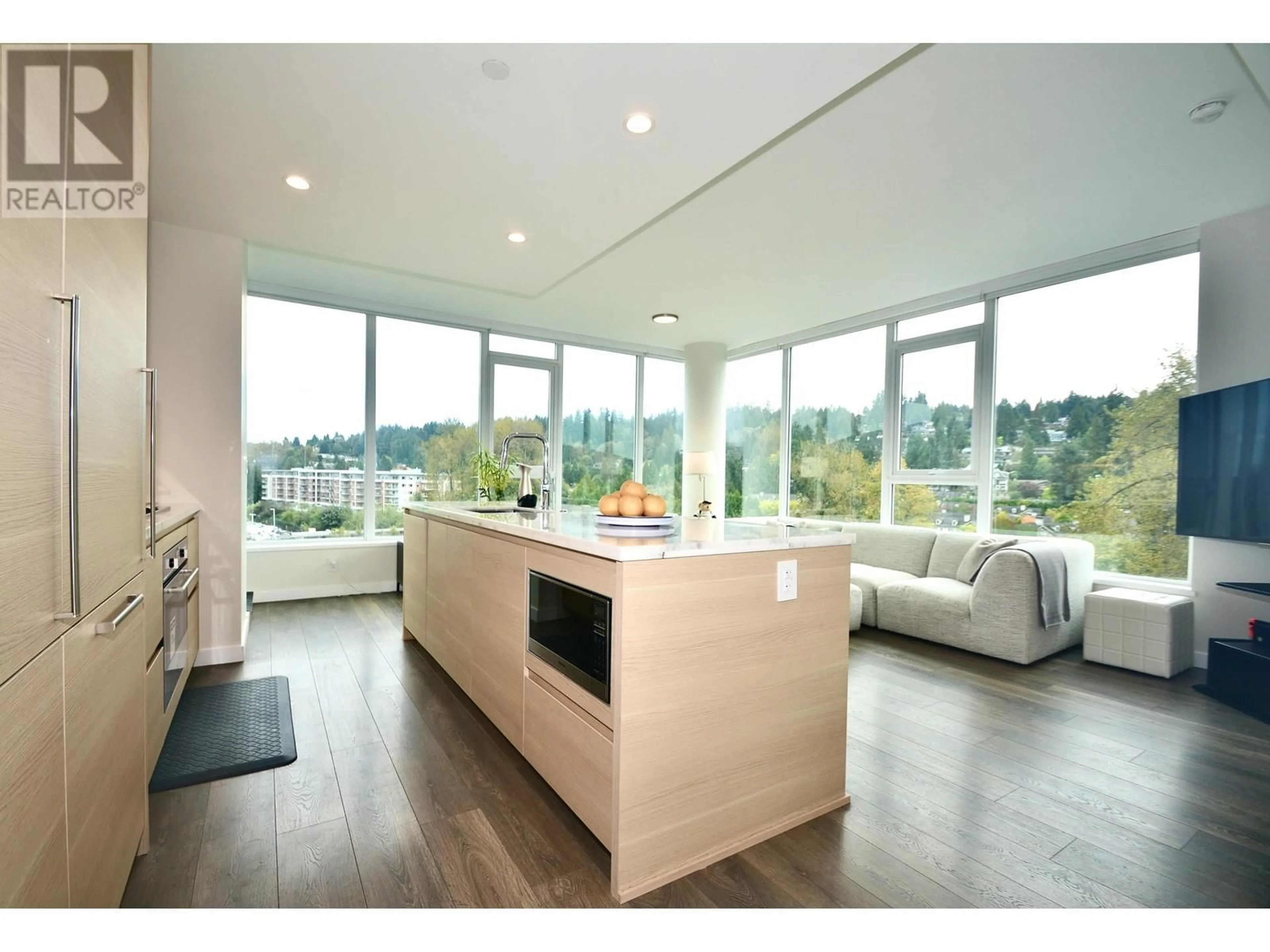 Open concept kitchen, wood/laminate floor for 1104 308 MORRISSEY ROAD, Port Moody British Columbia V3H0M2