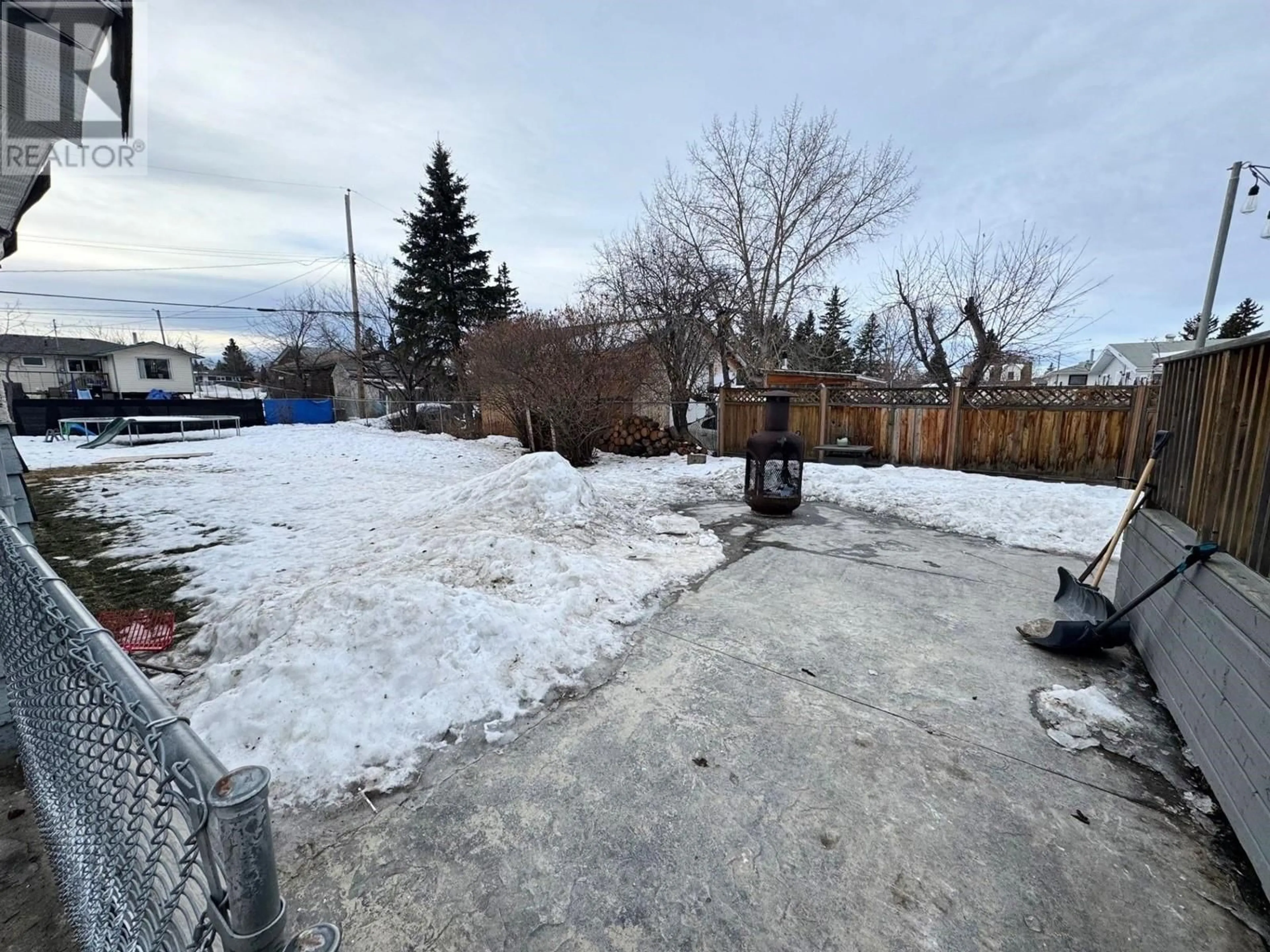 A pic from outside/outdoor area/front of a property/back of a property/a pic from drone, mountain view for 9539 112 AVENUE, Fort St. John British Columbia V1J2W1