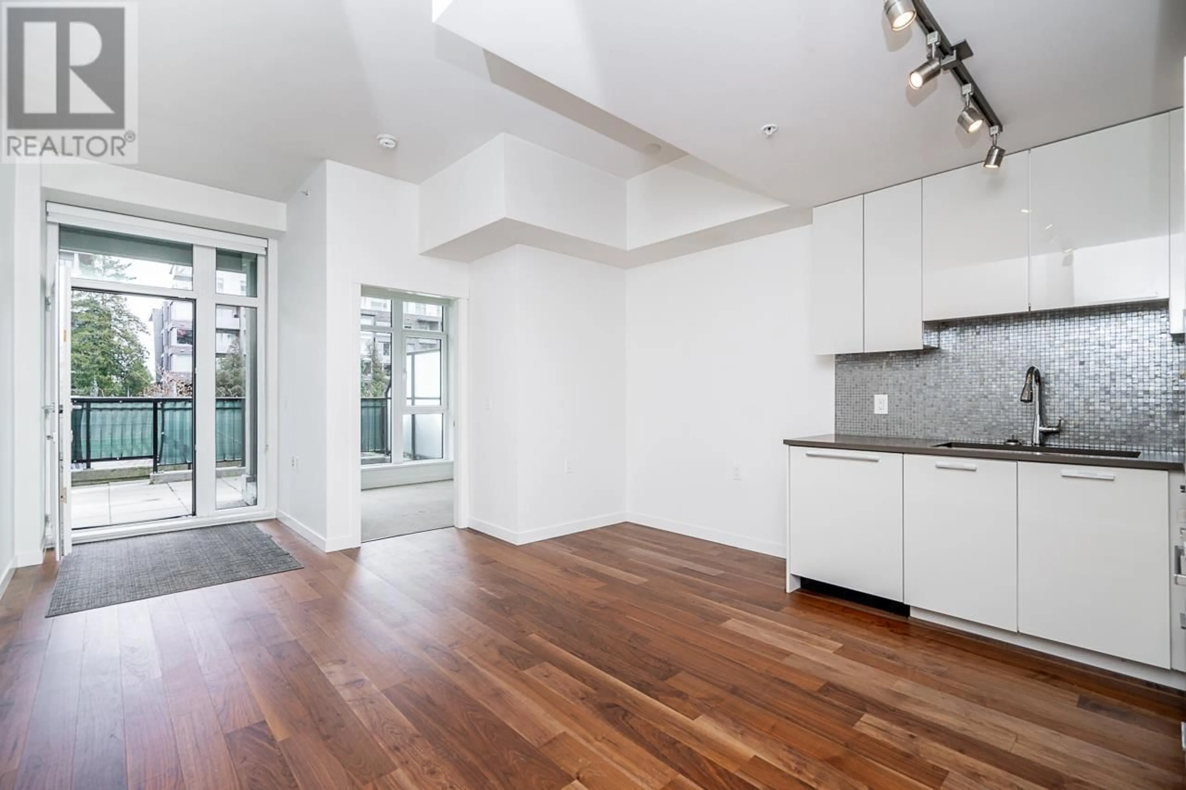 Open concept kitchen, unknown for 107 4171 CAMBIE STREET, Vancouver British Columbia V5Z2Y2