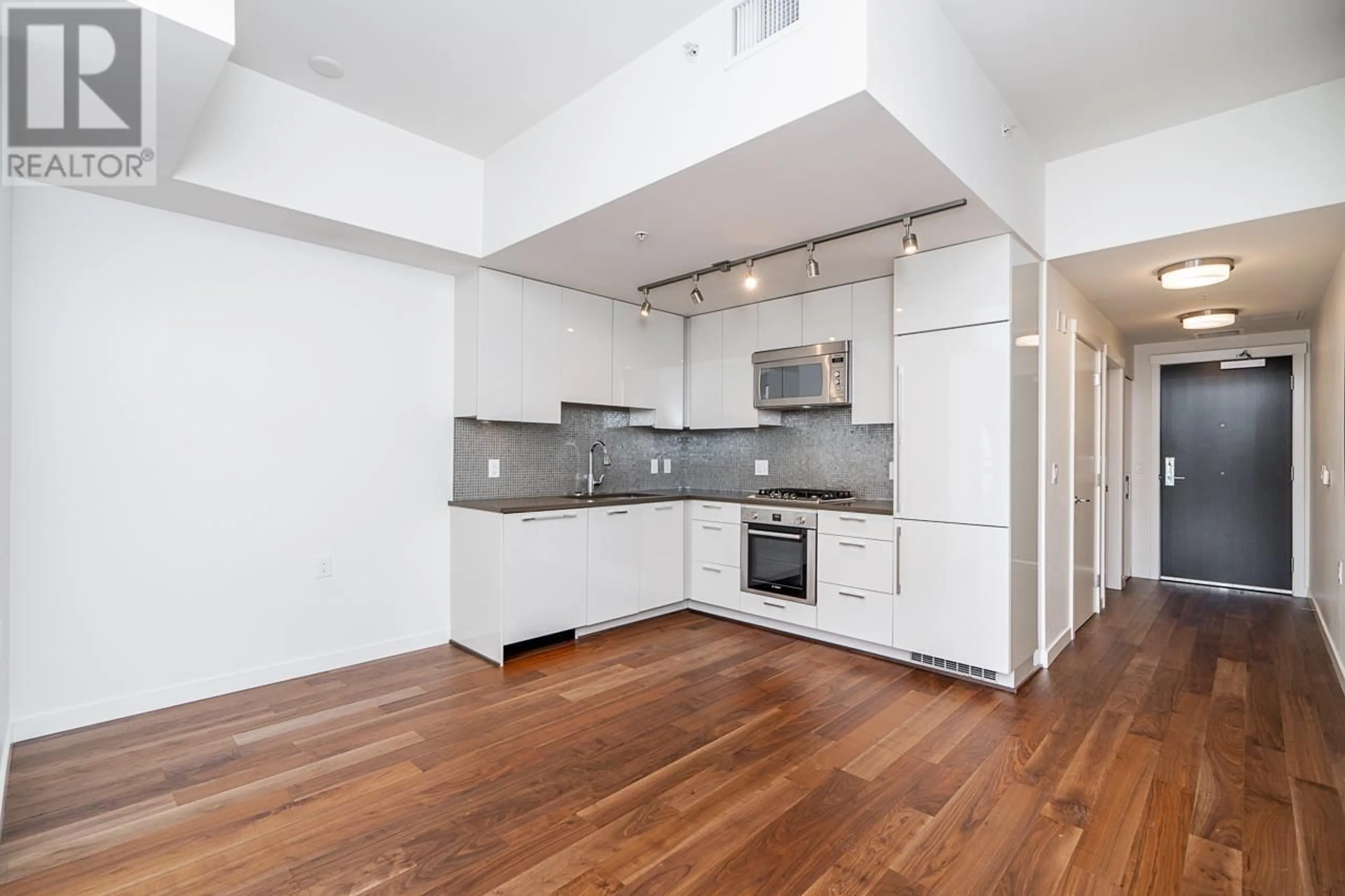 Open concept kitchen, unknown for 107 4171 CAMBIE STREET, Vancouver British Columbia V5Z2Y2