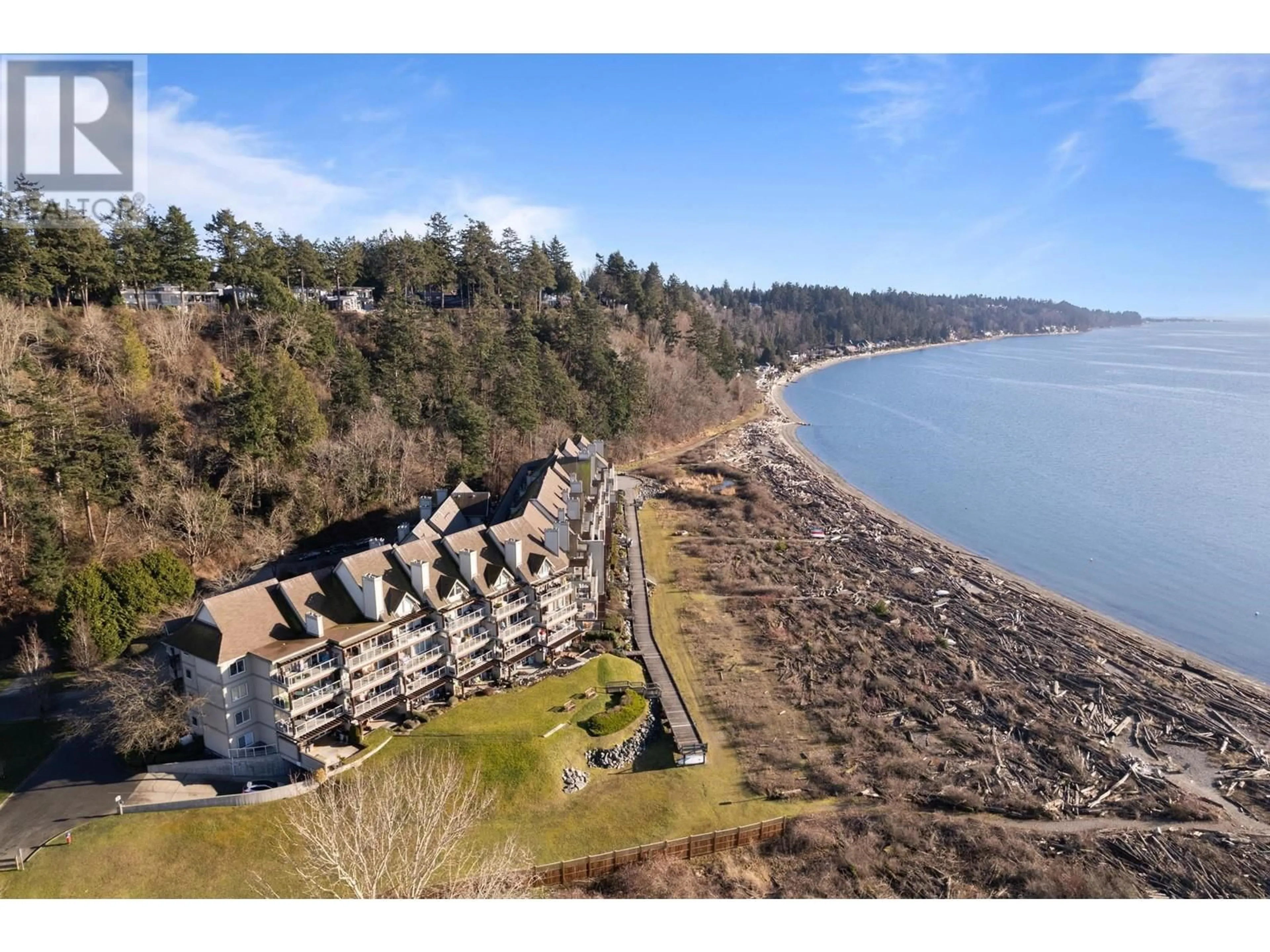 A pic from outside/outdoor area/front of a property/back of a property/a pic from drone, water/lake/river/ocean view for 320 1120 TSATSU SHORES DRIVE, Delta British Columbia V4M4G3