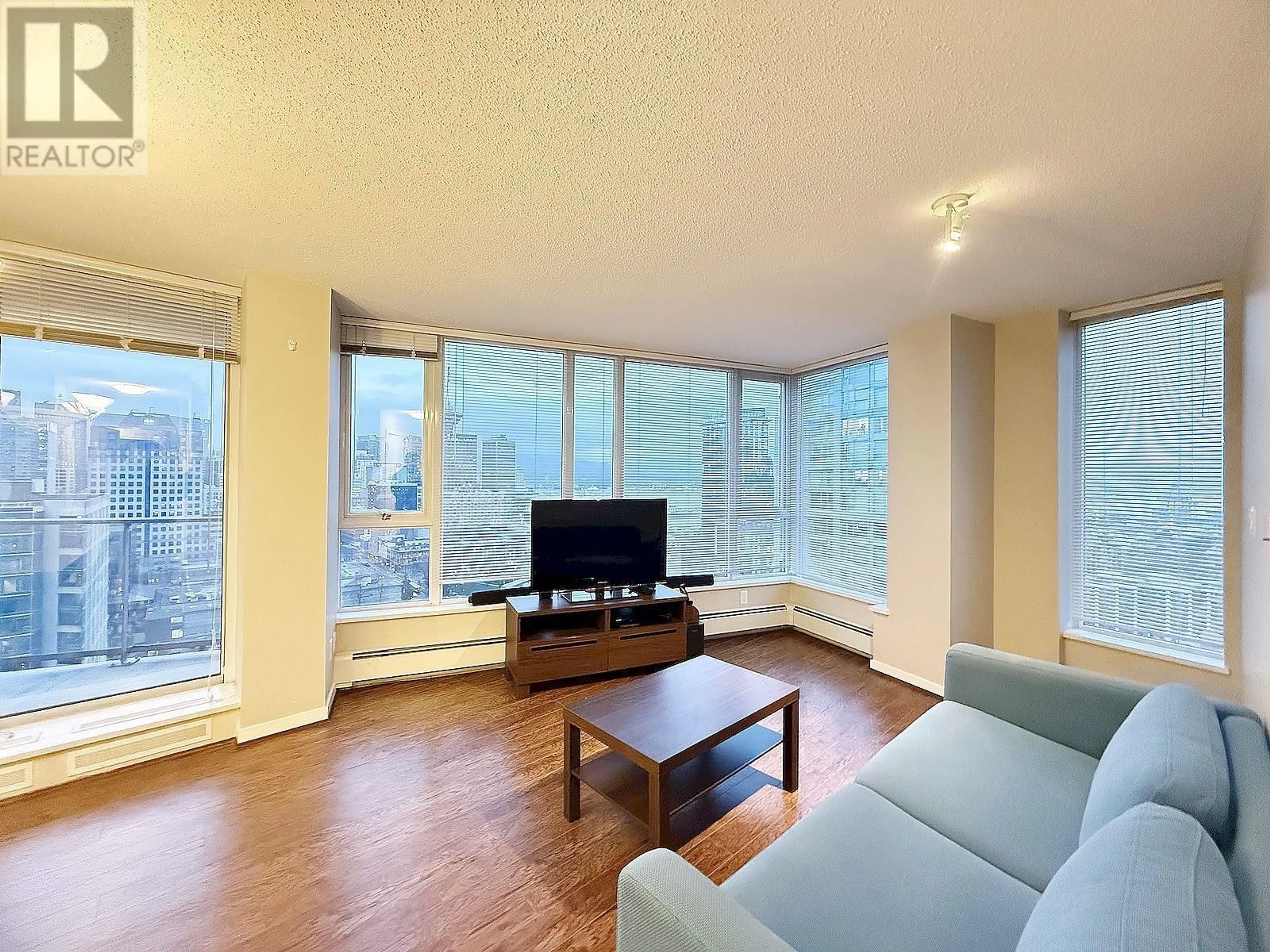 Living room with furniture, wood/laminate floor for 3103 188 KEEFER PLACE, Vancouver British Columbia V6B0J1