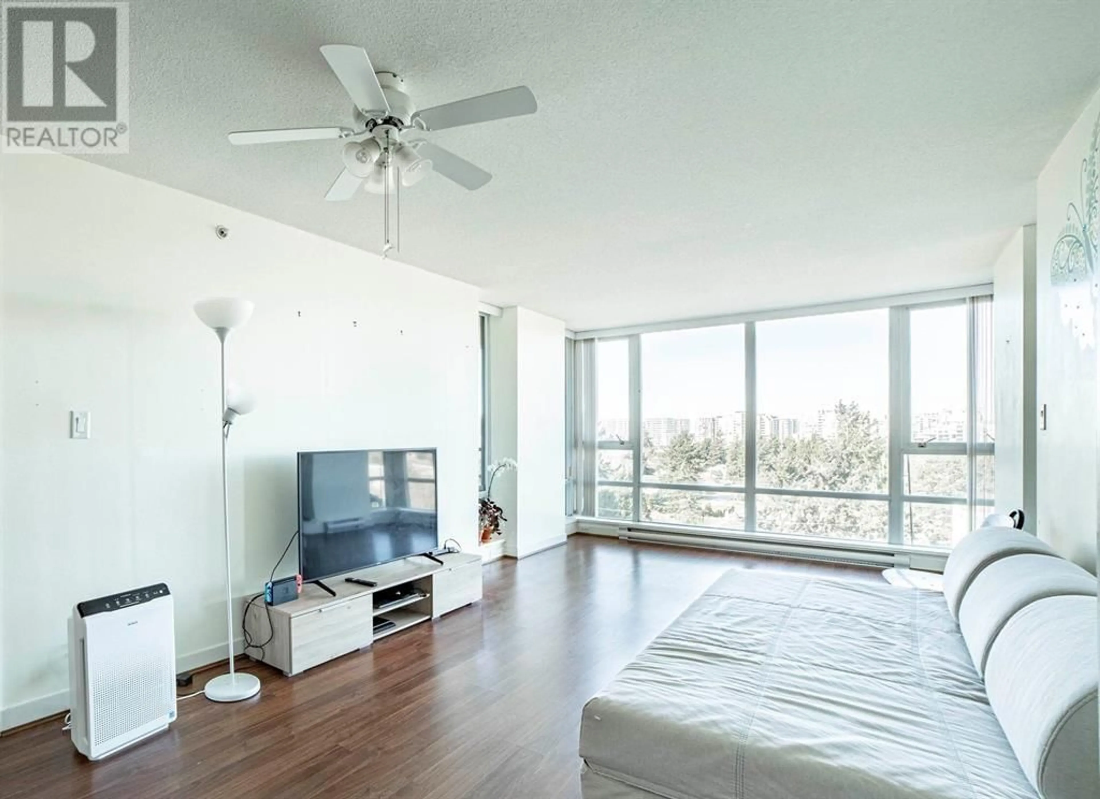 Living room with furniture, wood/laminate floor for 902 - 9171 FERNDALE ROAD, Richmond British Columbia V6Y0A5