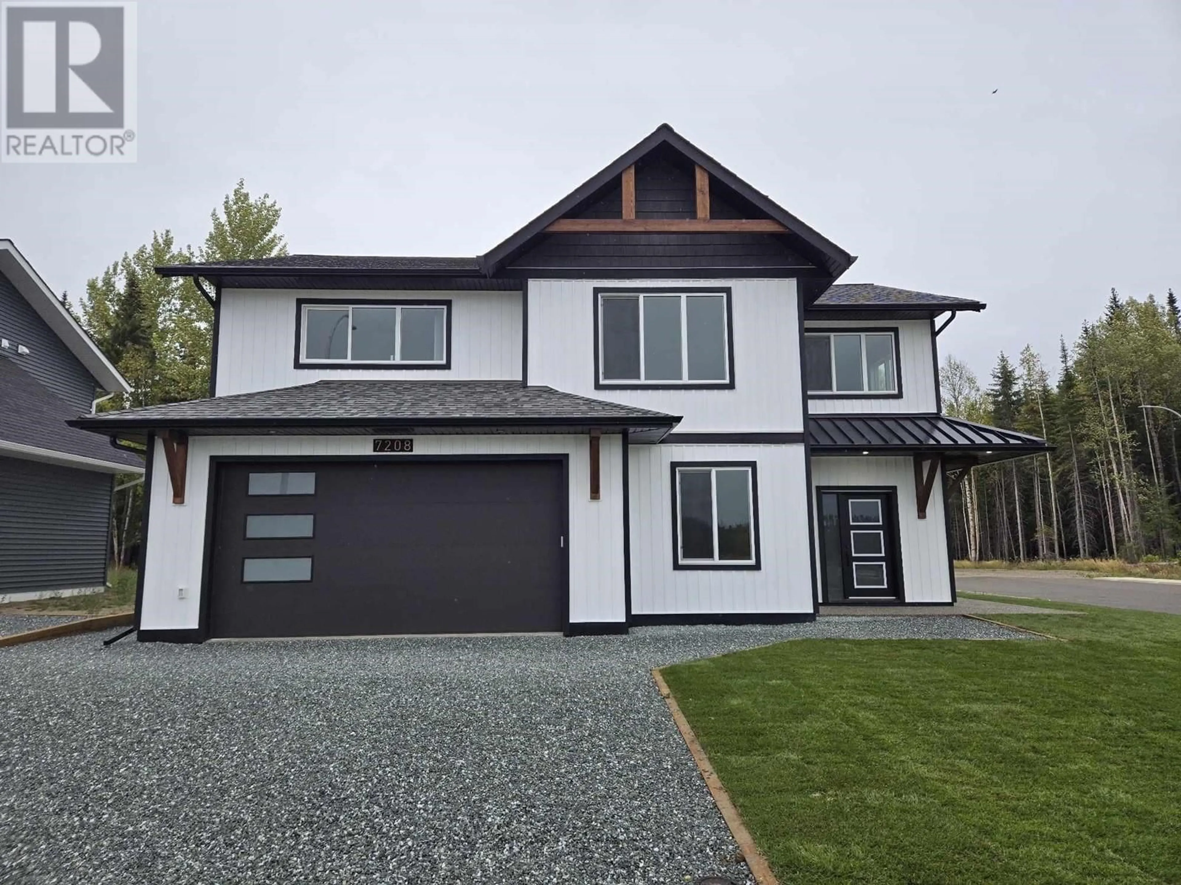 Home with vinyl exterior material, street for 7208 HILLU ROAD, Prince George British Columbia V2K0B4