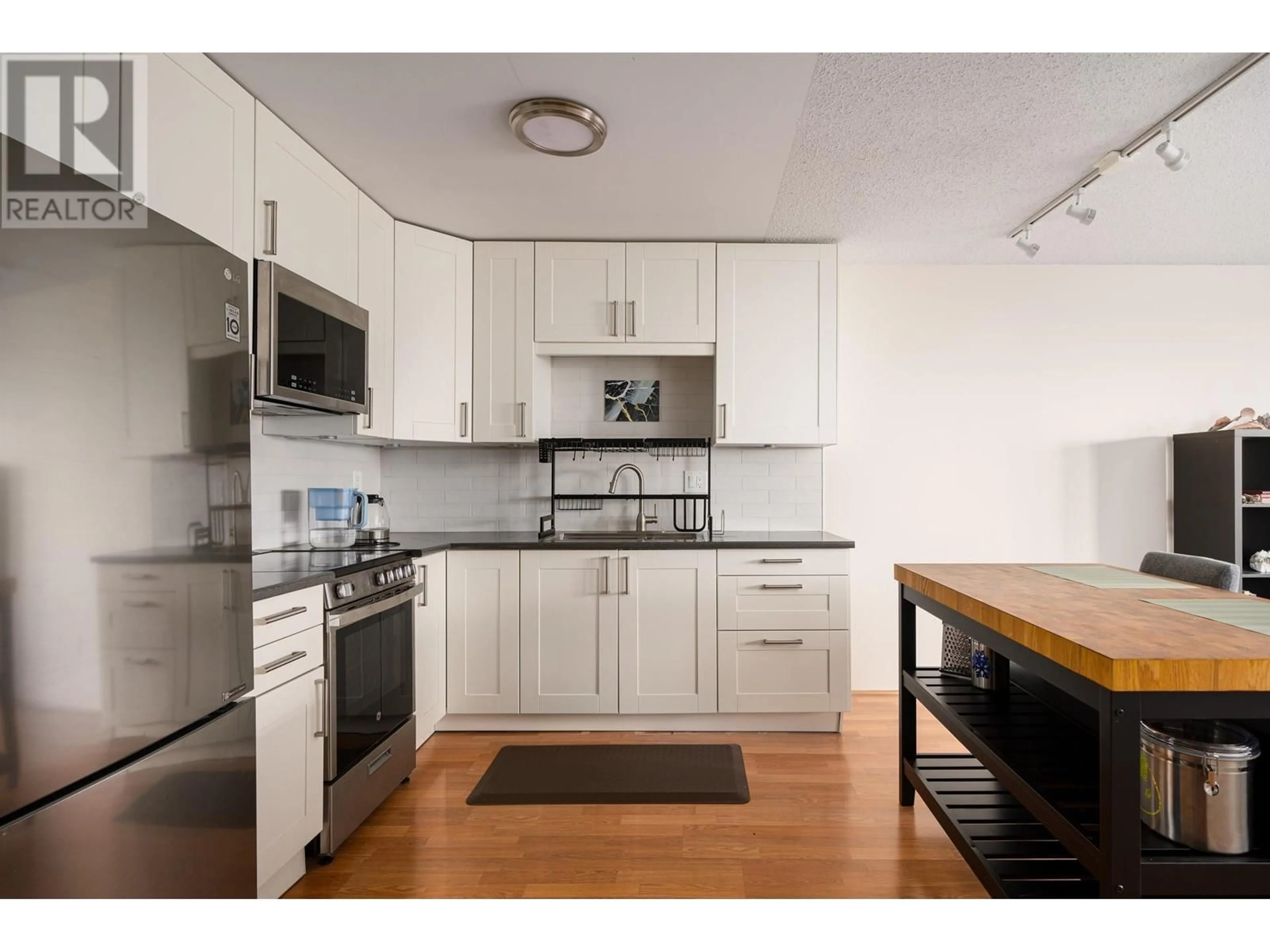 Standard kitchen, wood/laminate floor for 207 1122 KING ALBERT AVENUE, Coquitlam British Columbia V3J1X7