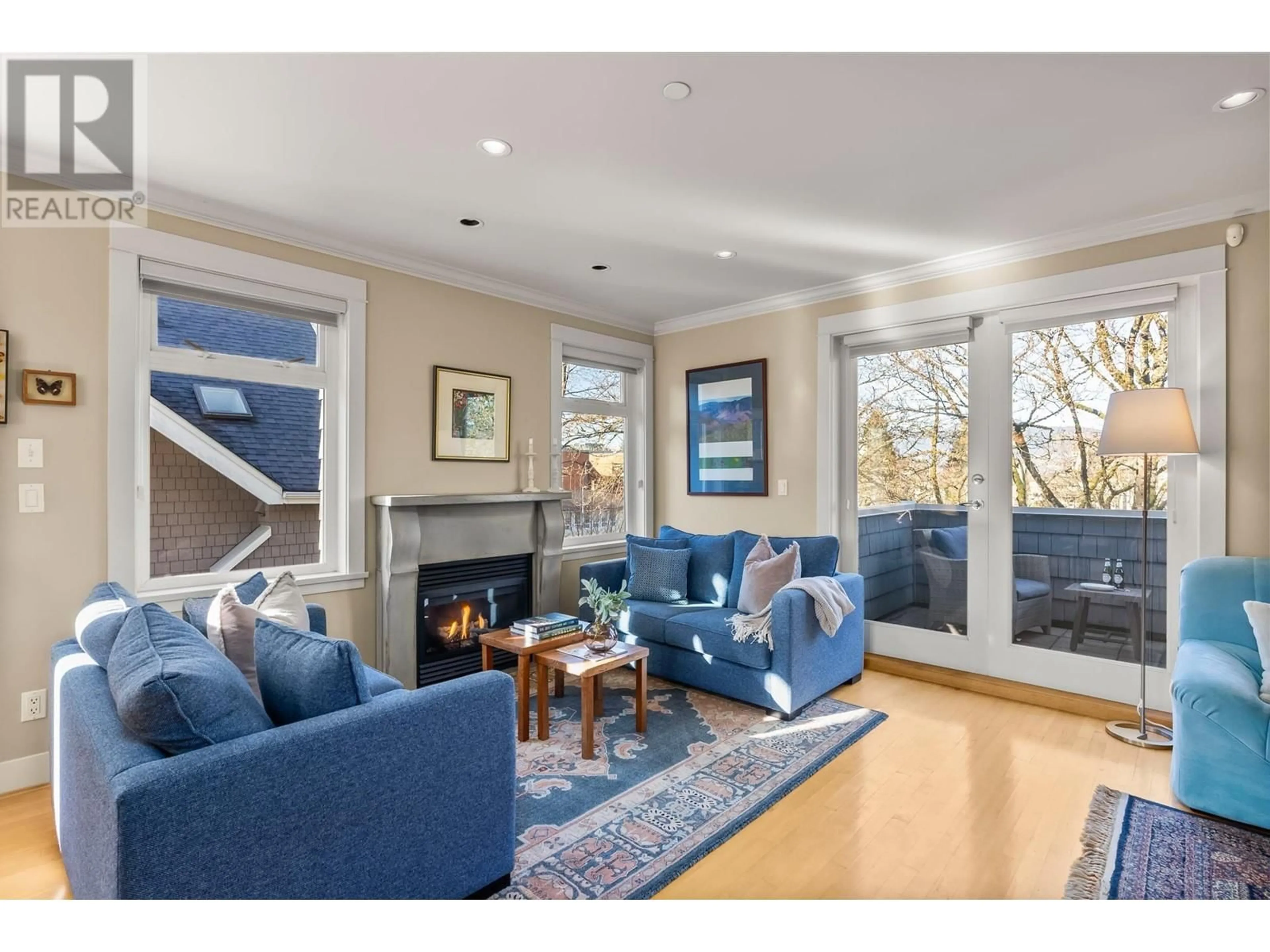 Living room with furniture, wood/laminate floor for 1916 W 11TH AVENUE, Vancouver British Columbia V6J2C6