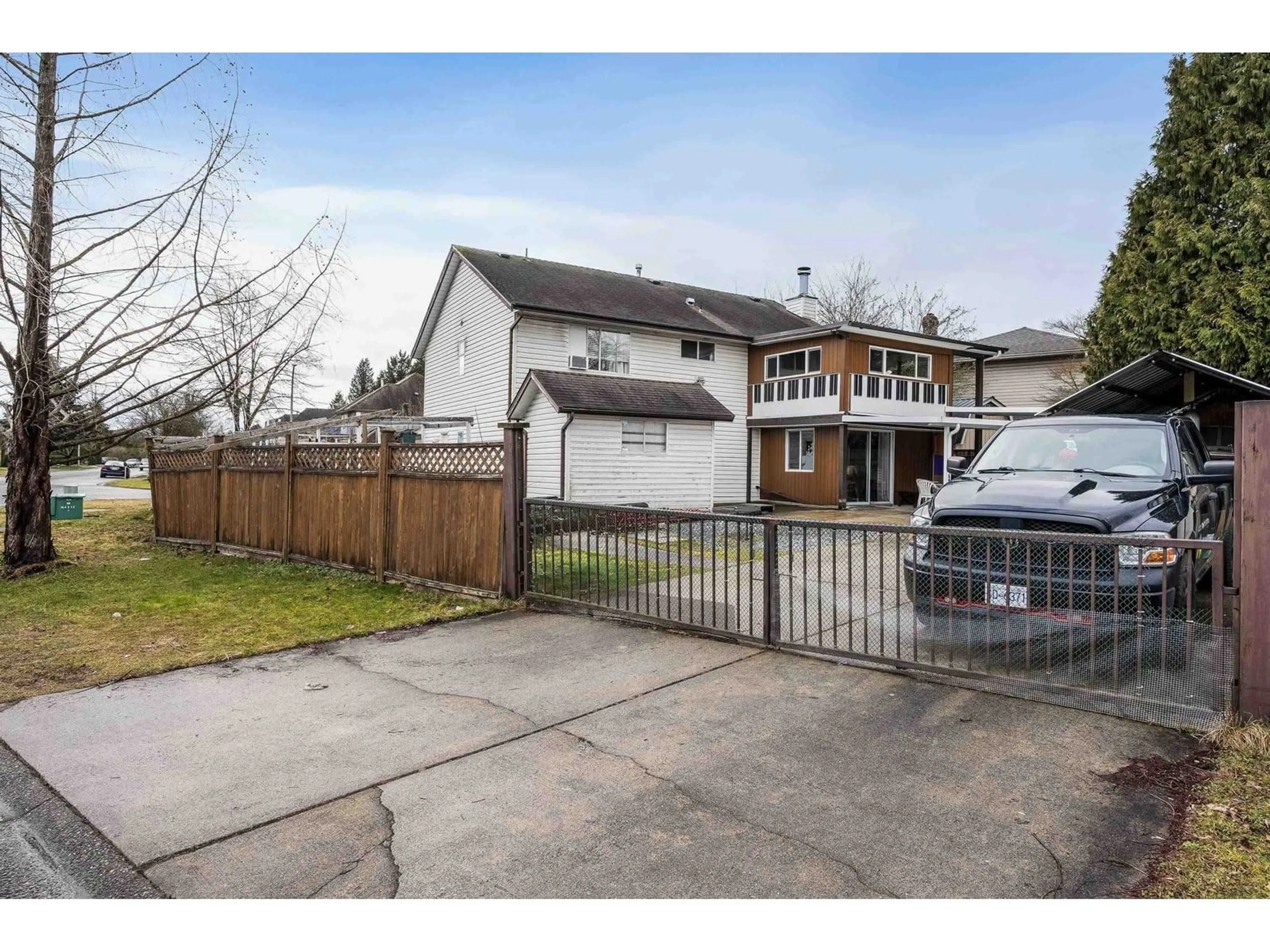 A pic from outside/outdoor area/front of a property/back of a property/a pic from drone, street for 15299 93A AVENUE, Surrey British Columbia V3R0E6