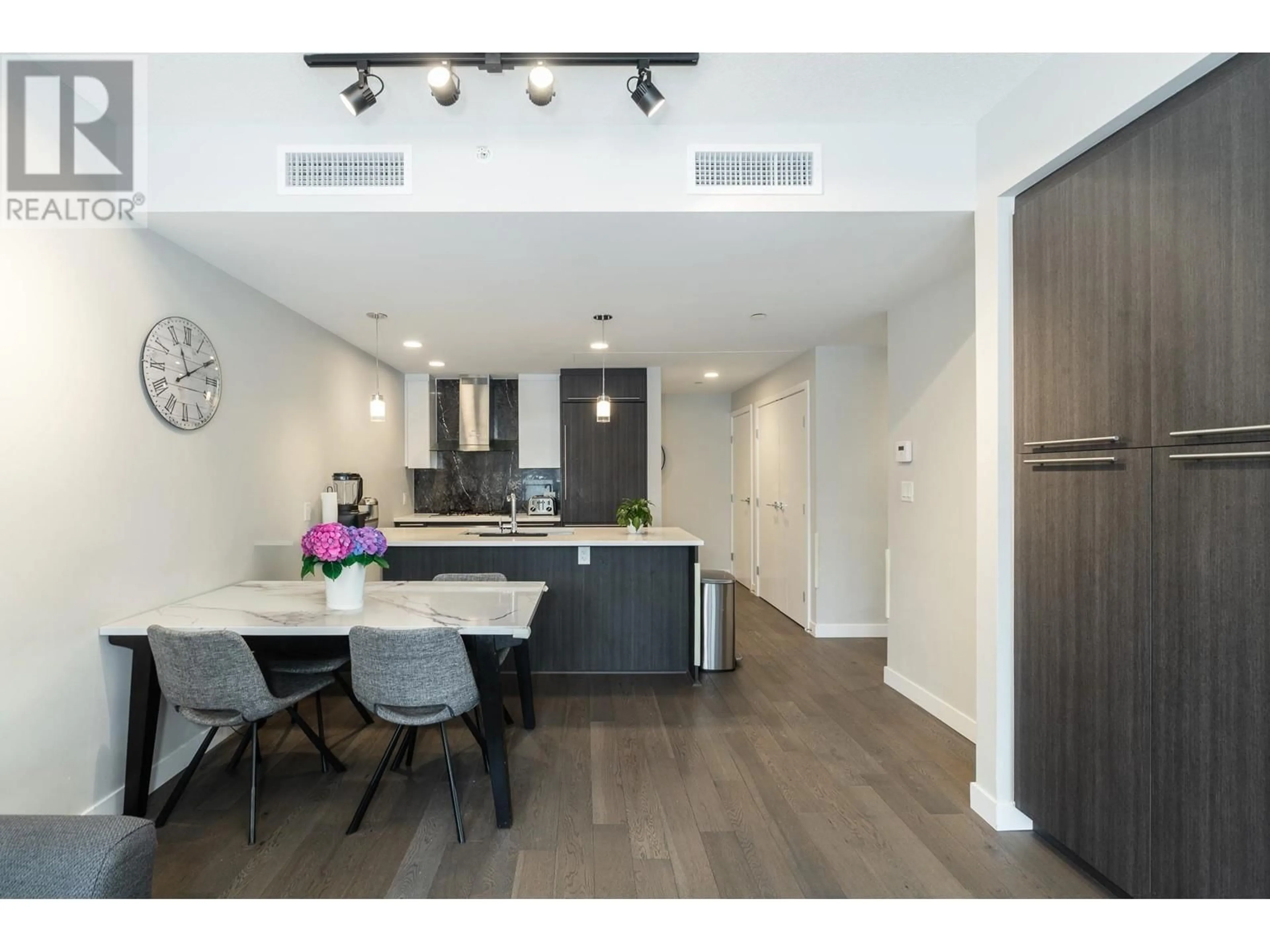 Open concept kitchen, wood/laminate floor for 205 5033 CAMBIE STREET, Vancouver British Columbia V5Z0H6